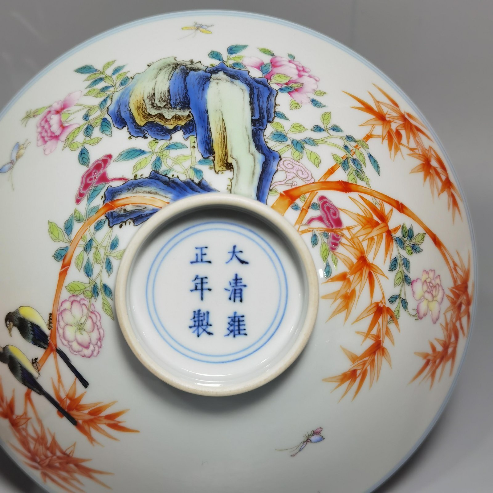Qing Dynasty Yongzheng a famille rose flower-and-bird hat bowl with three fruits inside