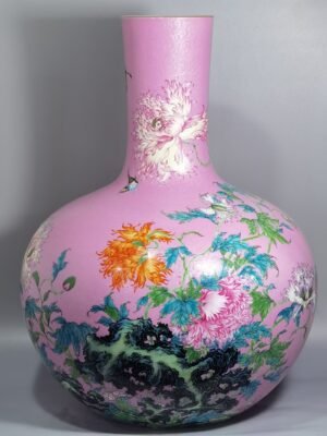Qing Dynasty Yongzheng a pink celestial vase with pastel flowers and poppy flowers