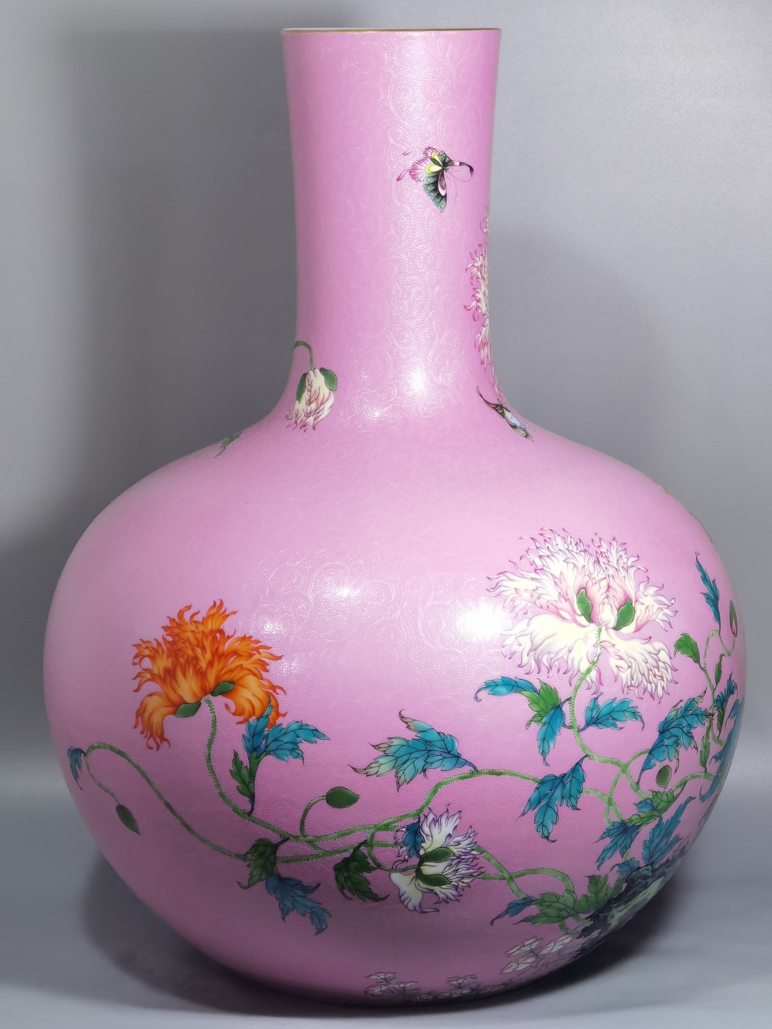 Qing Dynasty Yongzheng a pink celestial vase with pastel flowers and poppy flowers