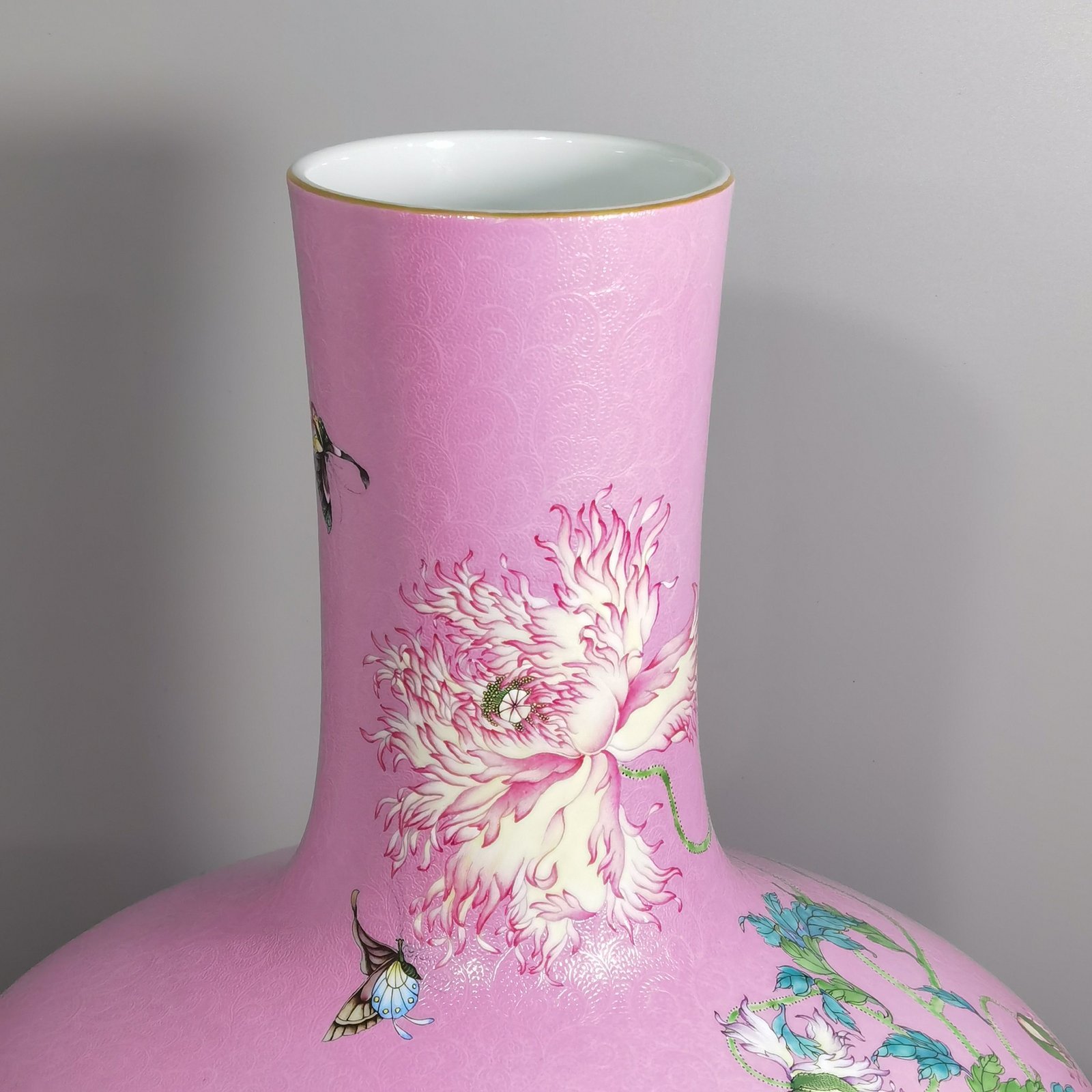 Qing Dynasty Yongzheng a pink celestial vase with pastel flowers and poppy flowers