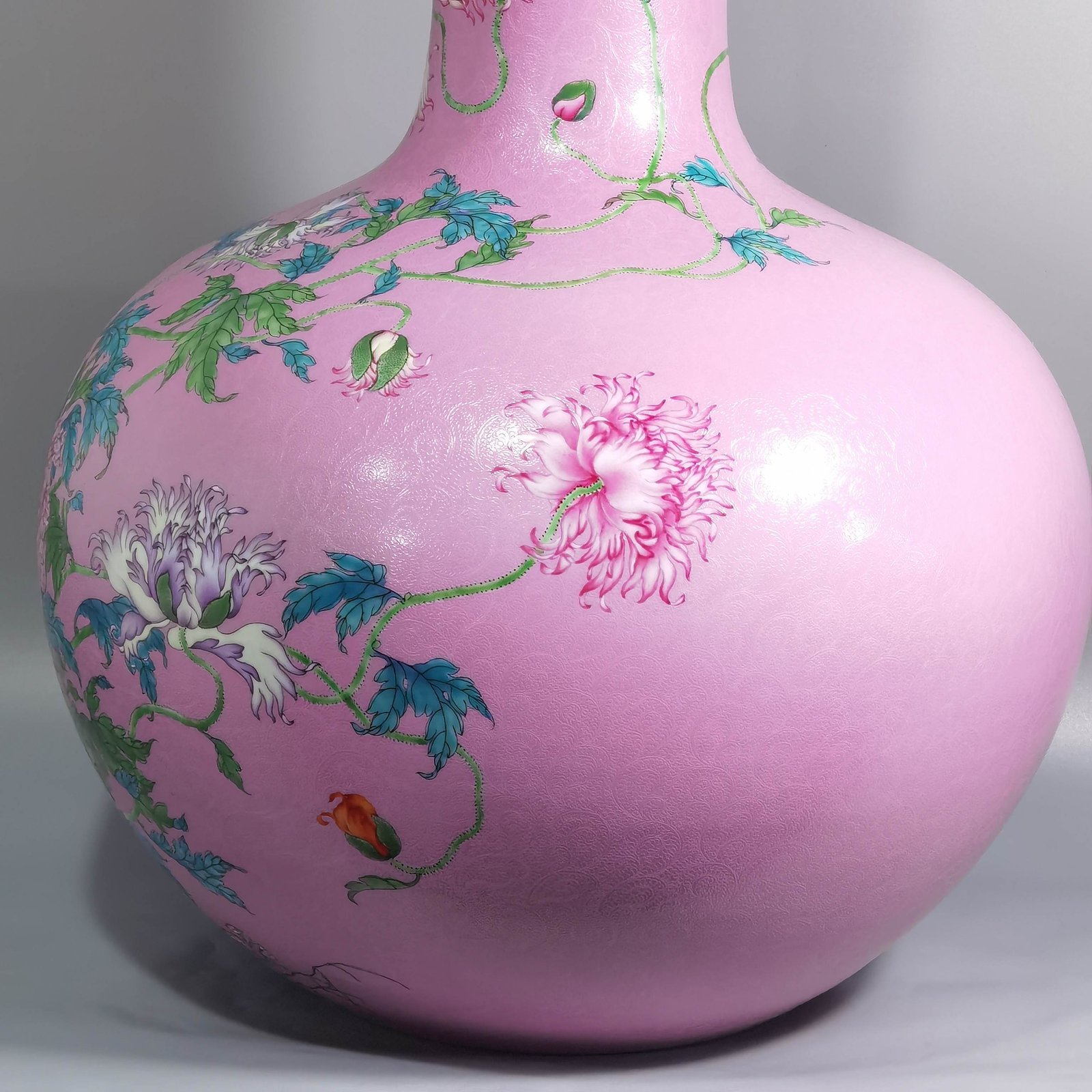 Qing Dynasty Yongzheng a pink celestial vase with pastel flowers and poppy flowers
