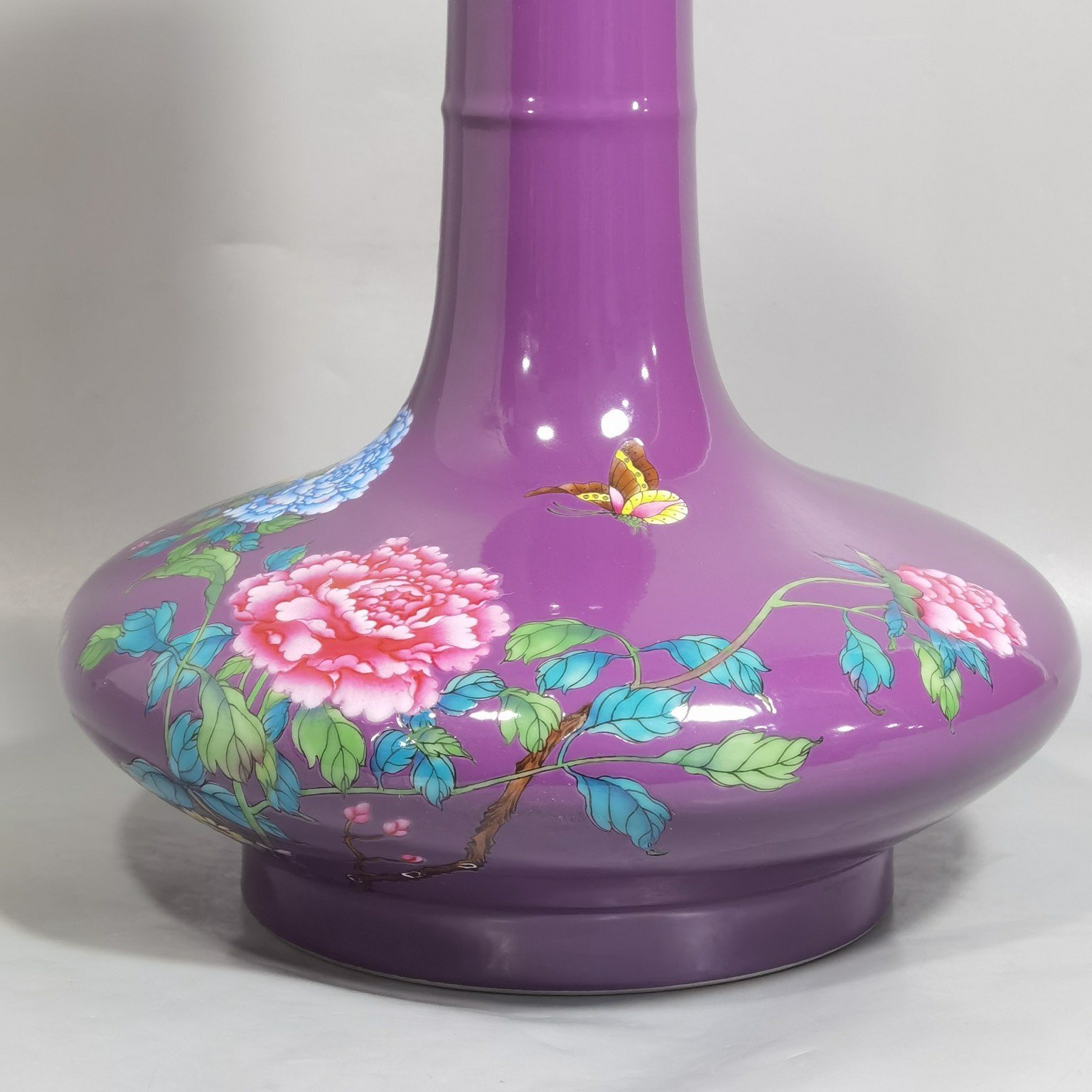 Qing Dynasty Yongzheng purple ground pastel peony flower flat belly vase