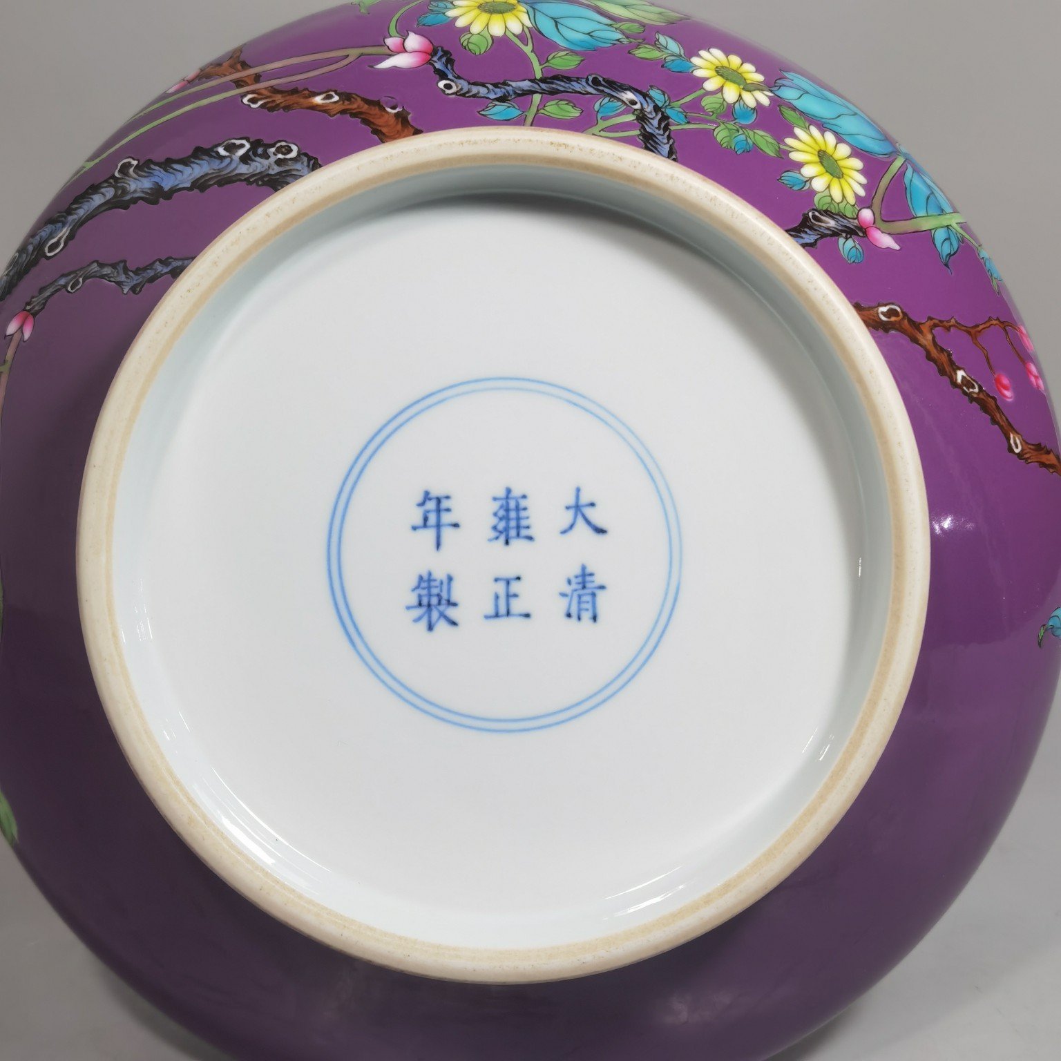 Qing Dynasty Yongzheng purple ground pastel peony flower flat belly vase