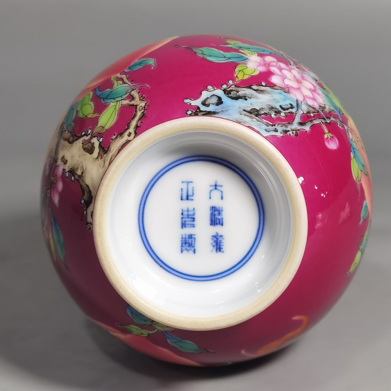 Qing Dynasty Yongzheng A pair of rouge ground pastel eight peach and five blessing vases during