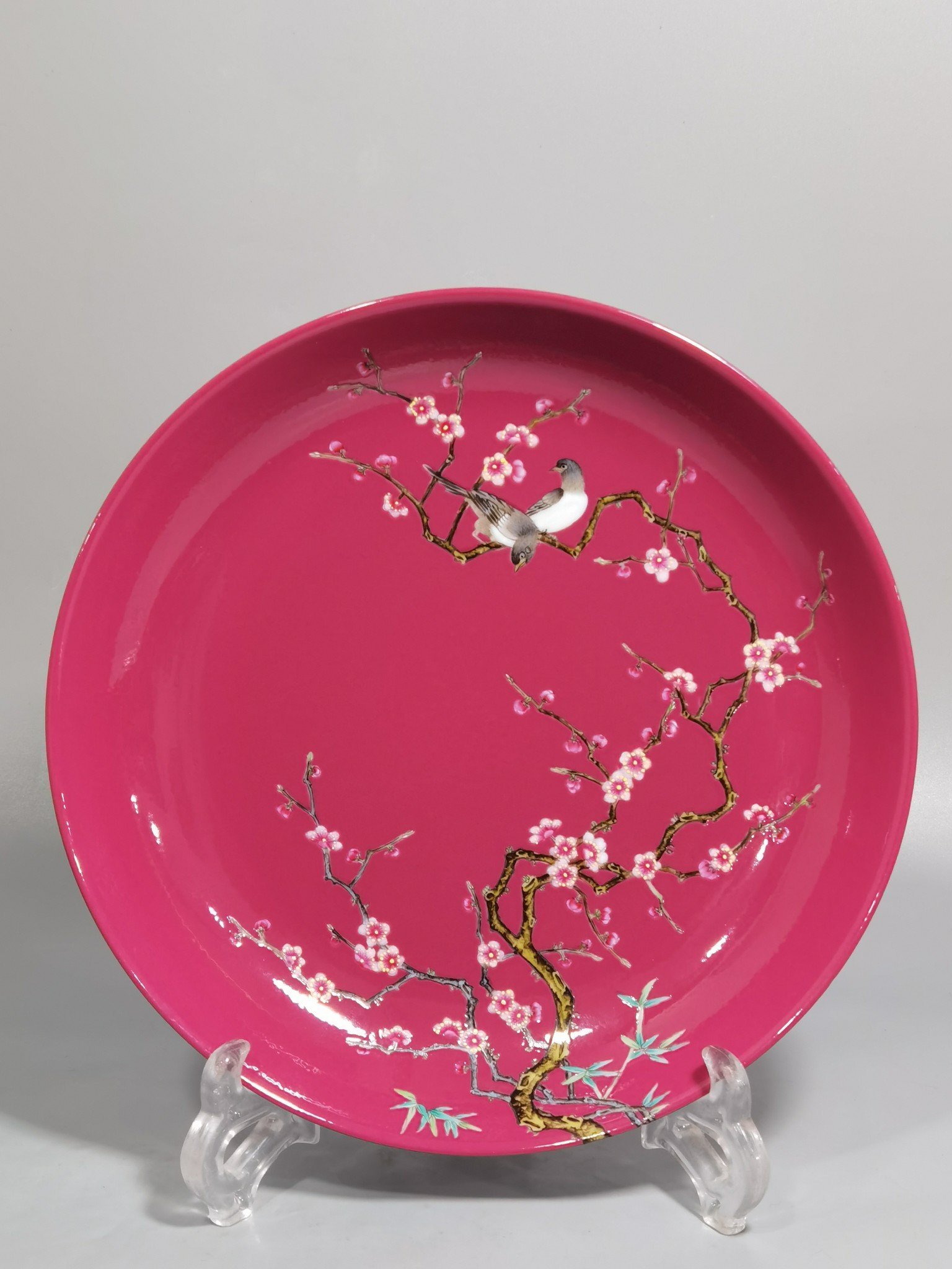 Qing Dynasty Yongzheng a pair of pink and pink magpies climbing plum blossoms on a rouge ground