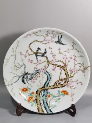 Qing Dynasty Yongzheng a large pastel-colored magpie climbing a plum blossom plate