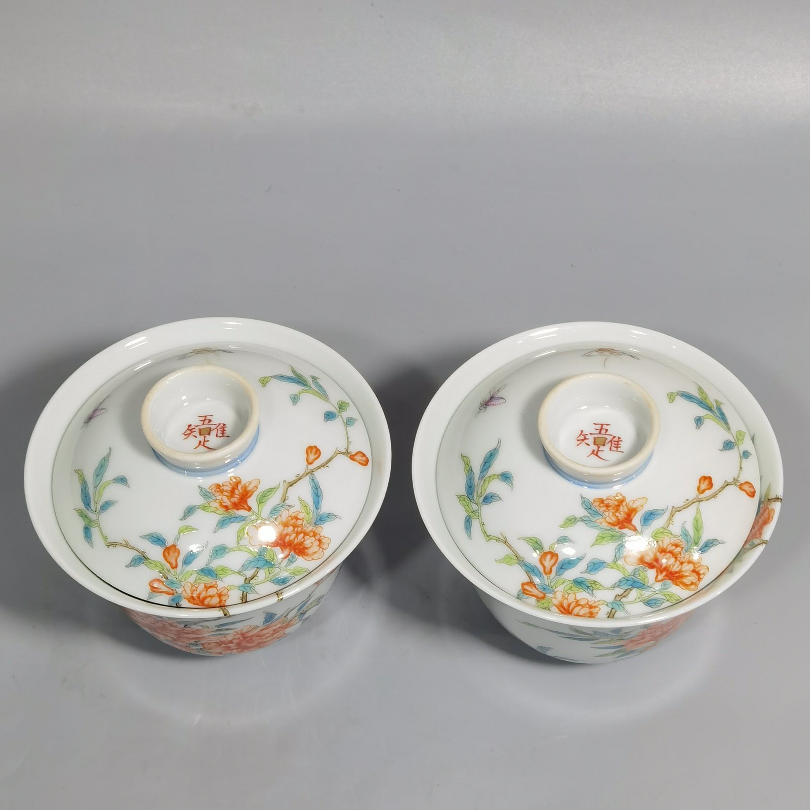 Qing Dynasty Yongzheng A pair of over-branch pastel pomegranate flower tureens