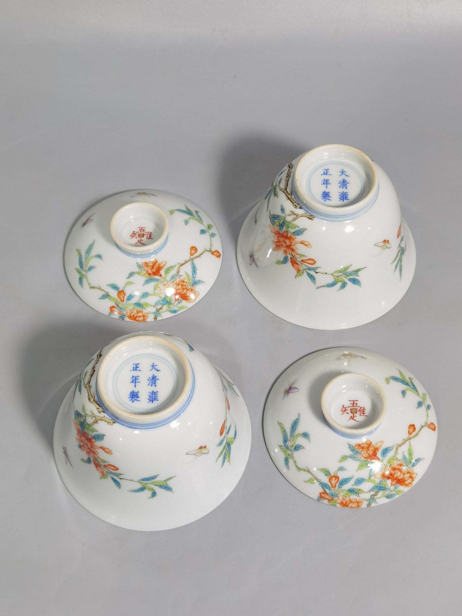 Qing Dynasty Yongzheng A pair of over-branch pastel pomegranate flower tureens