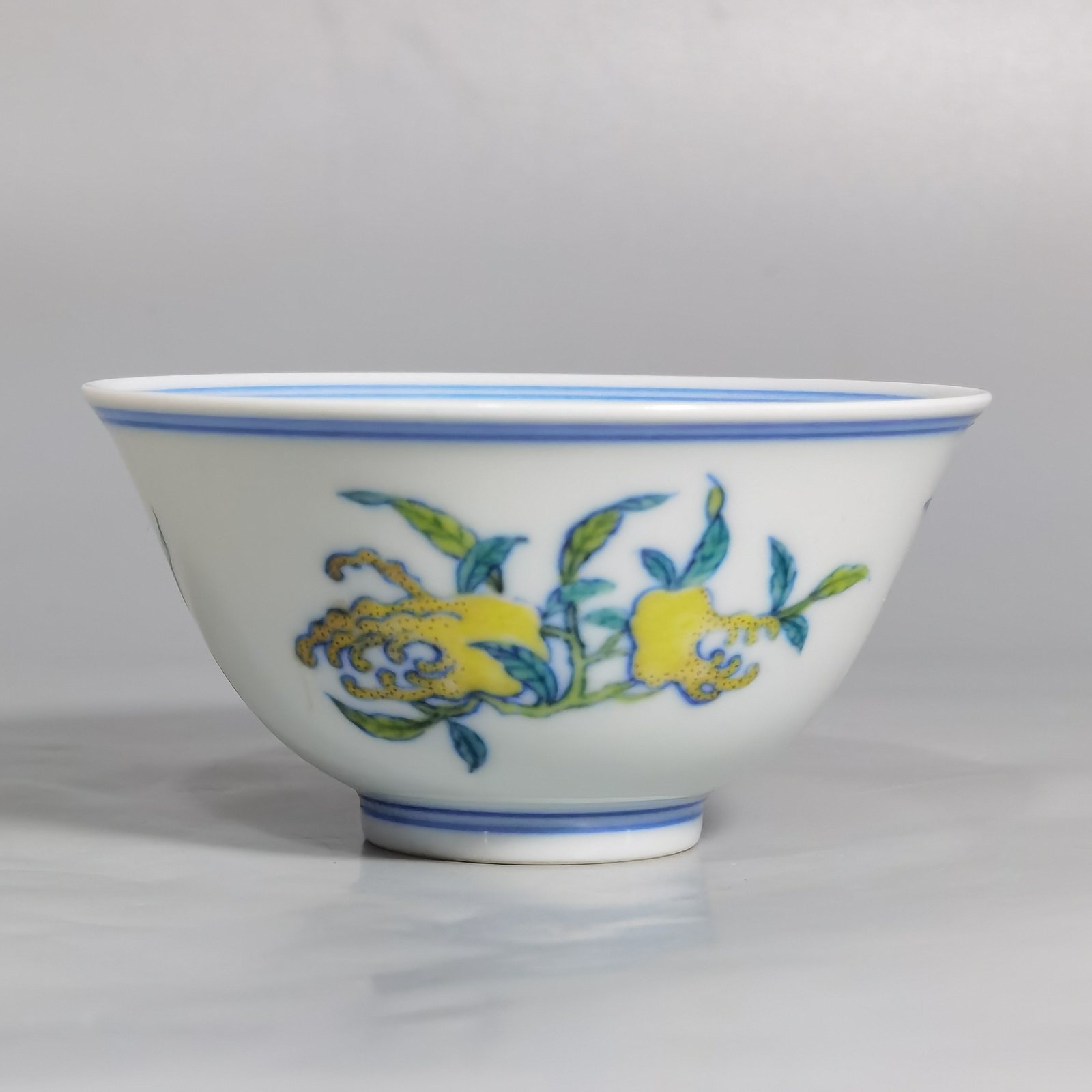 Qing Dynasty Yongzheng A pair of blue and white Doucai Sanduo pattern cups