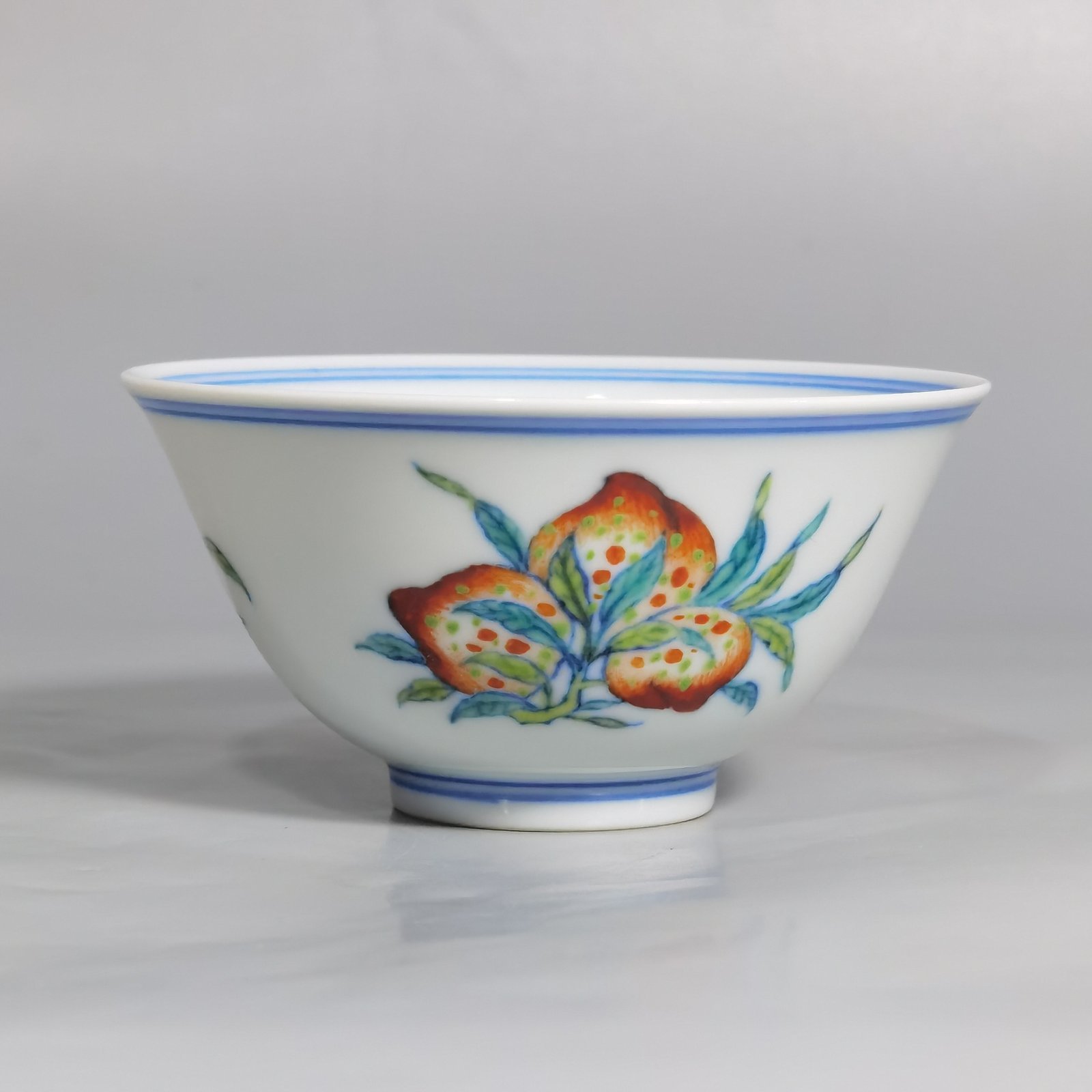 Qing Dynasty Yongzheng A pair of blue and white Doucai Sanduo pattern cups