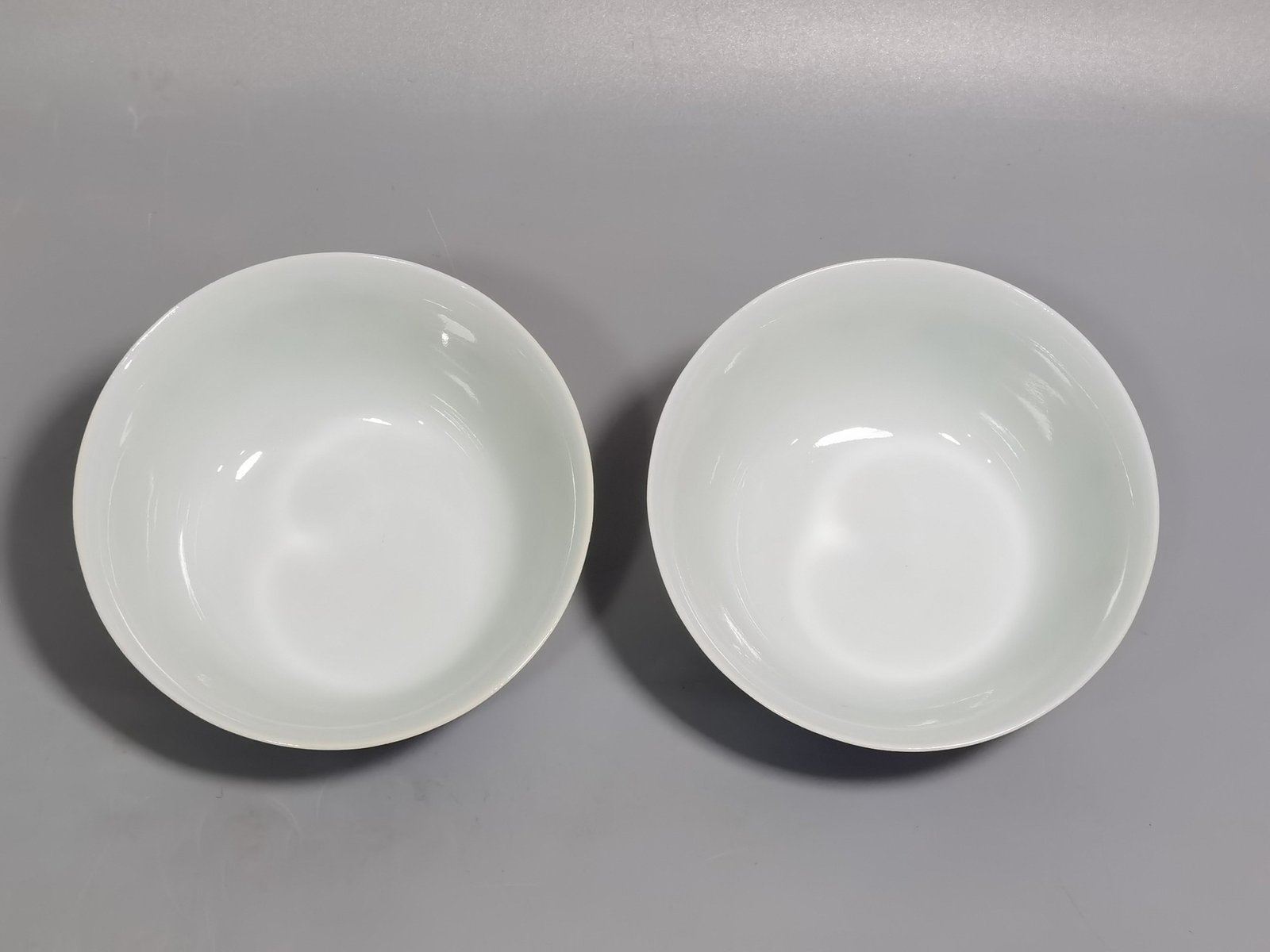 Qing Dynasty Yongzheng blue and white fighting color chicken cup