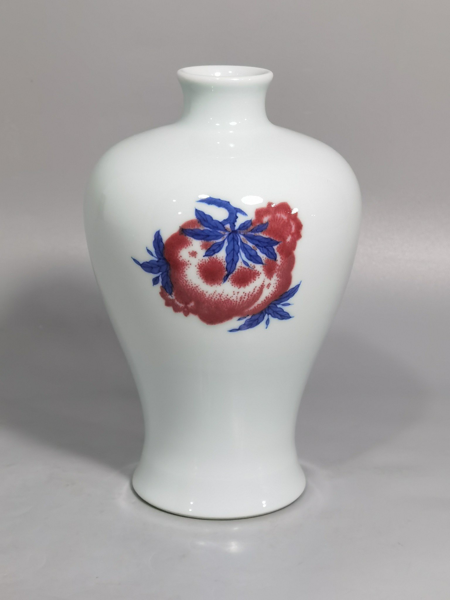 Qing Dynasty Yongzheng blue and white underglaze red plum vase