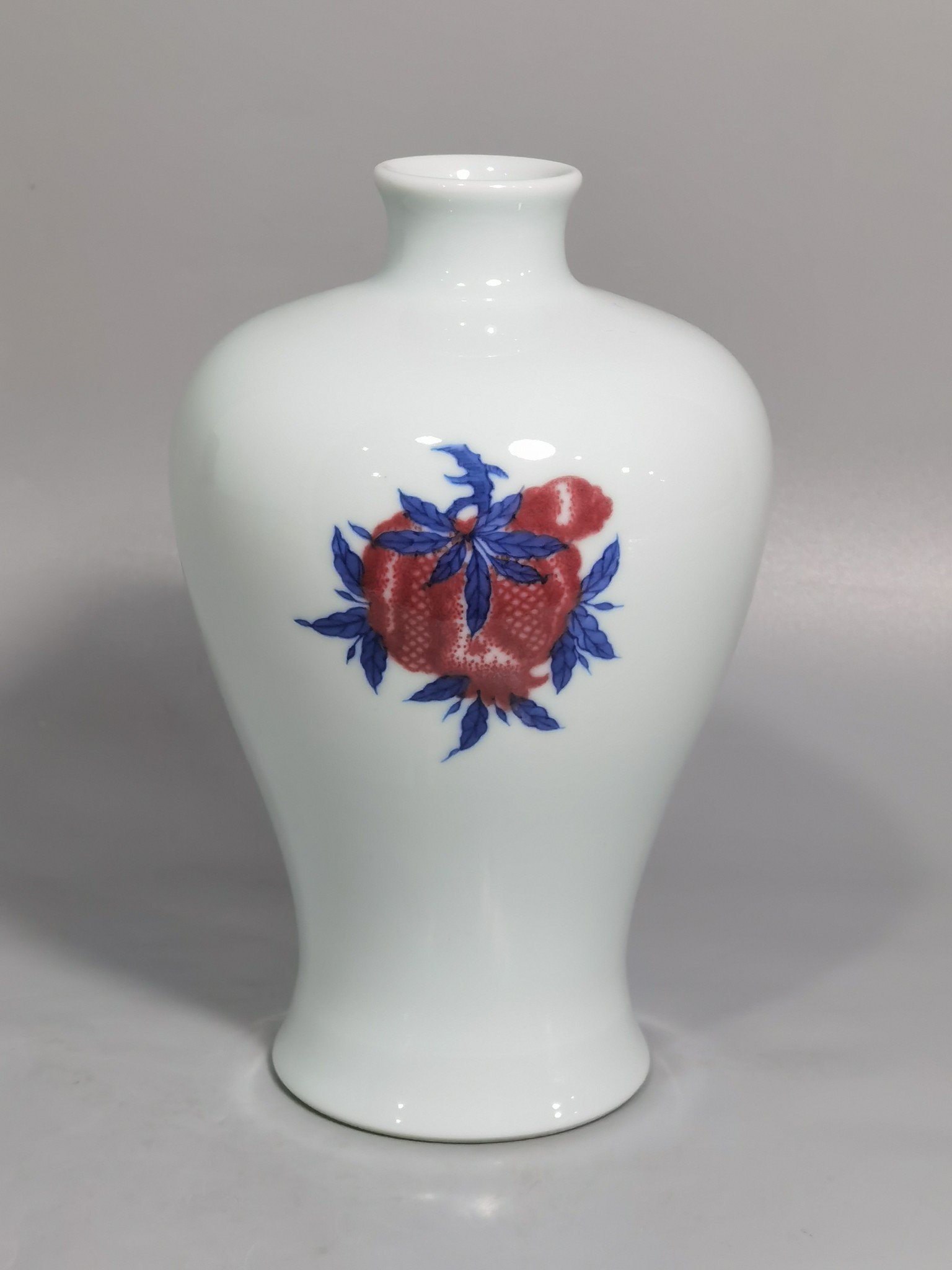 Qing Dynasty Yongzheng blue and white underglaze red plum vase