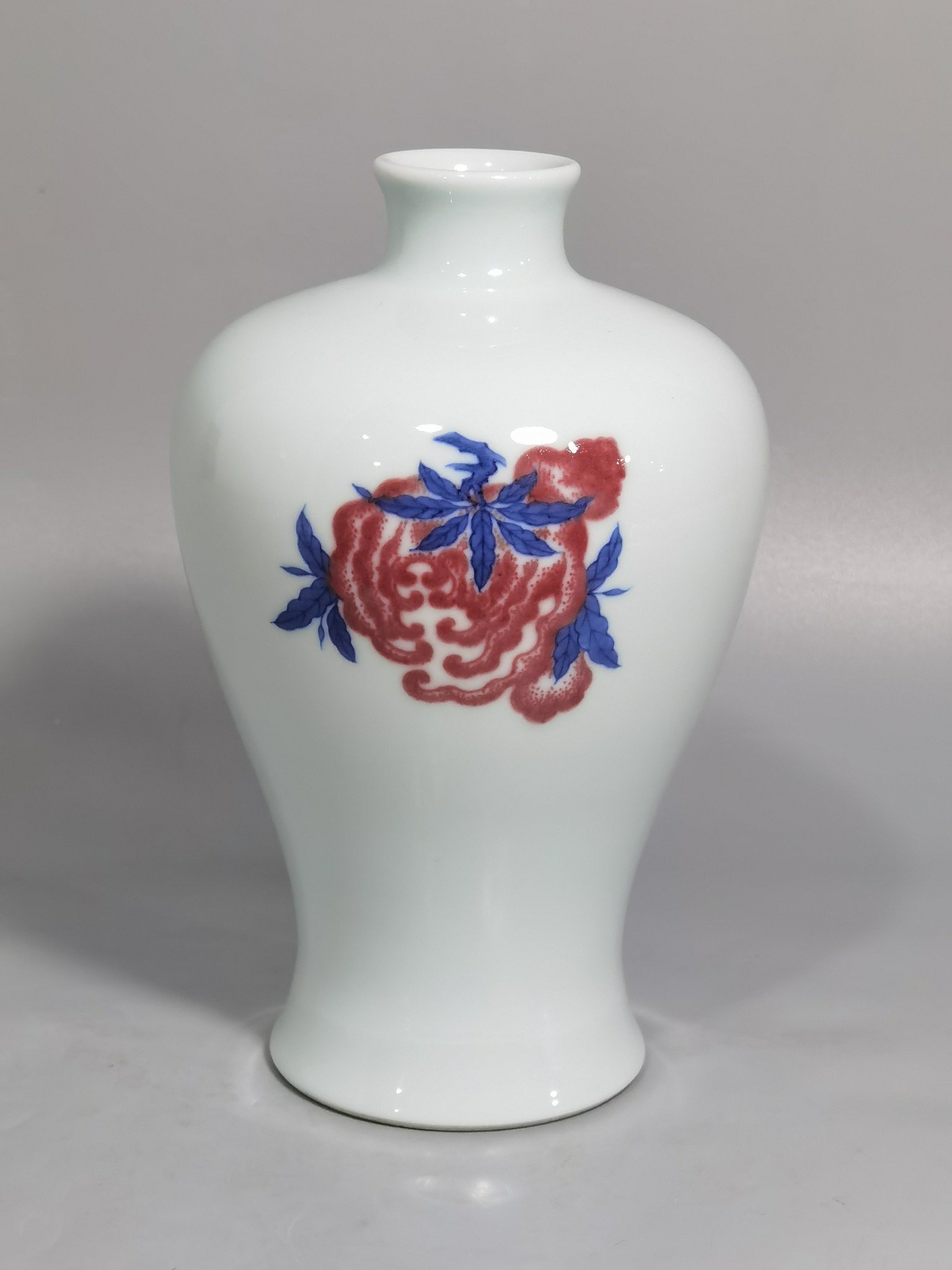 Qing Dynasty Yongzheng blue and white underglaze red plum vase