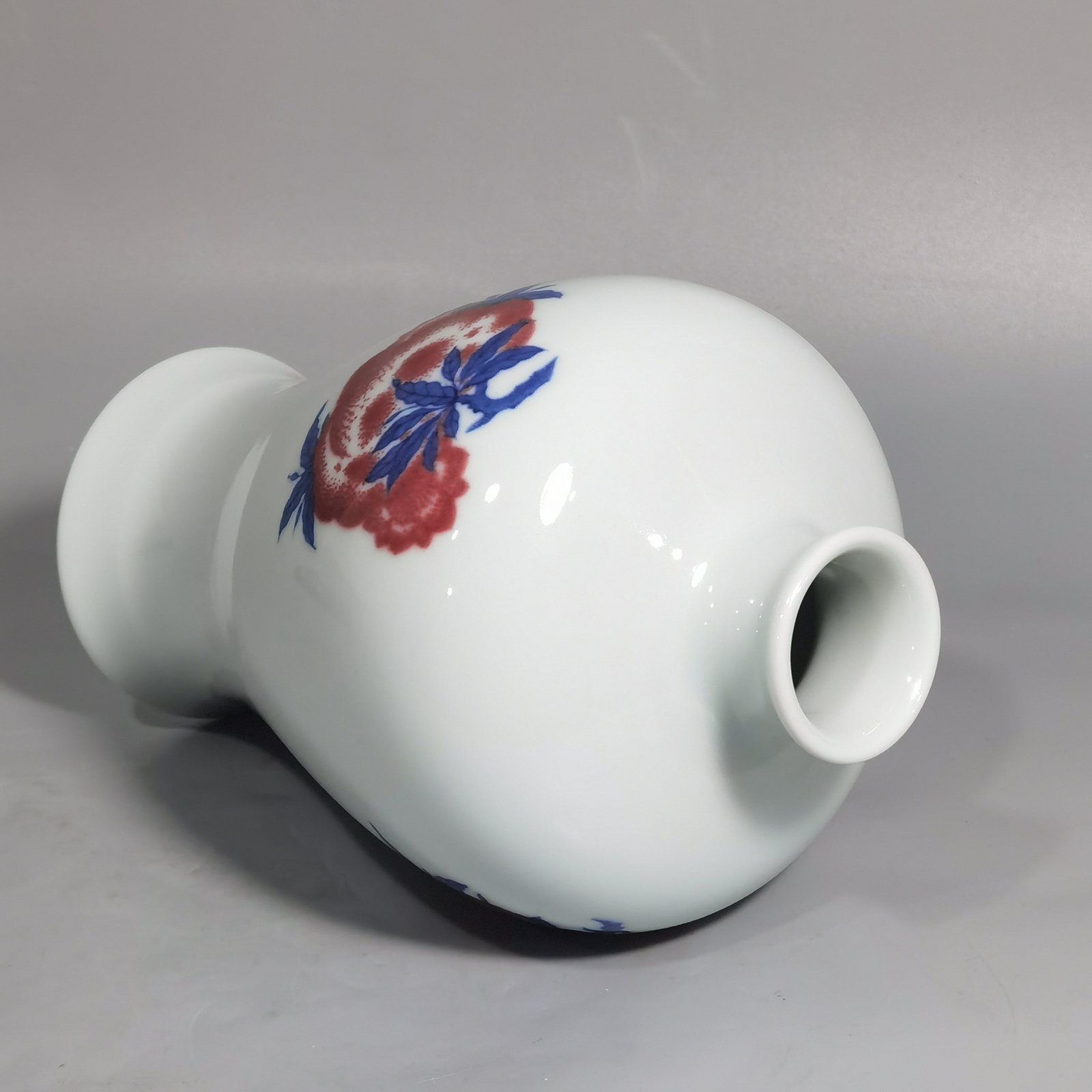 Qing Dynasty Yongzheng blue and white underglaze red plum vase