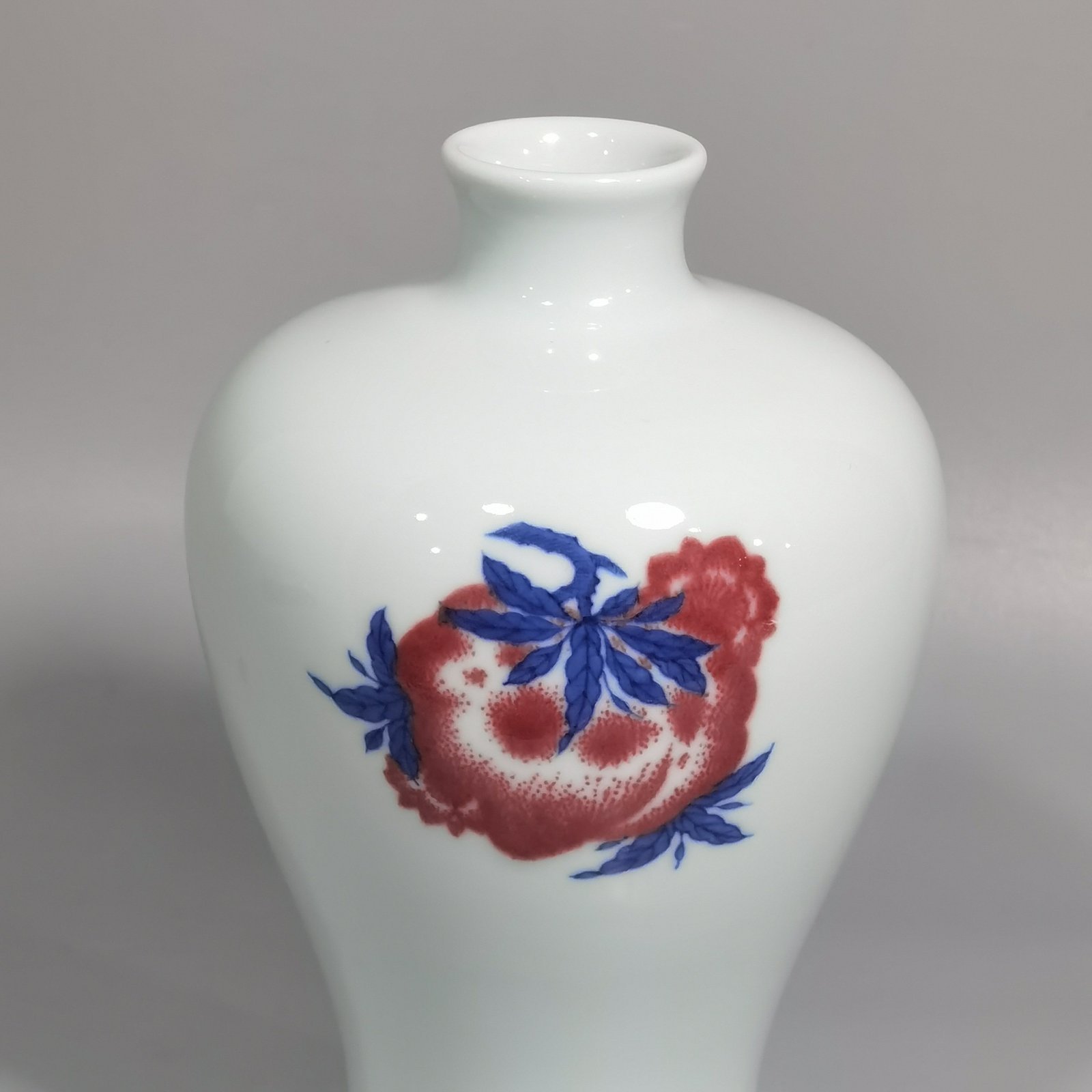 Qing Dynasty Yongzheng blue and white underglaze red plum vase