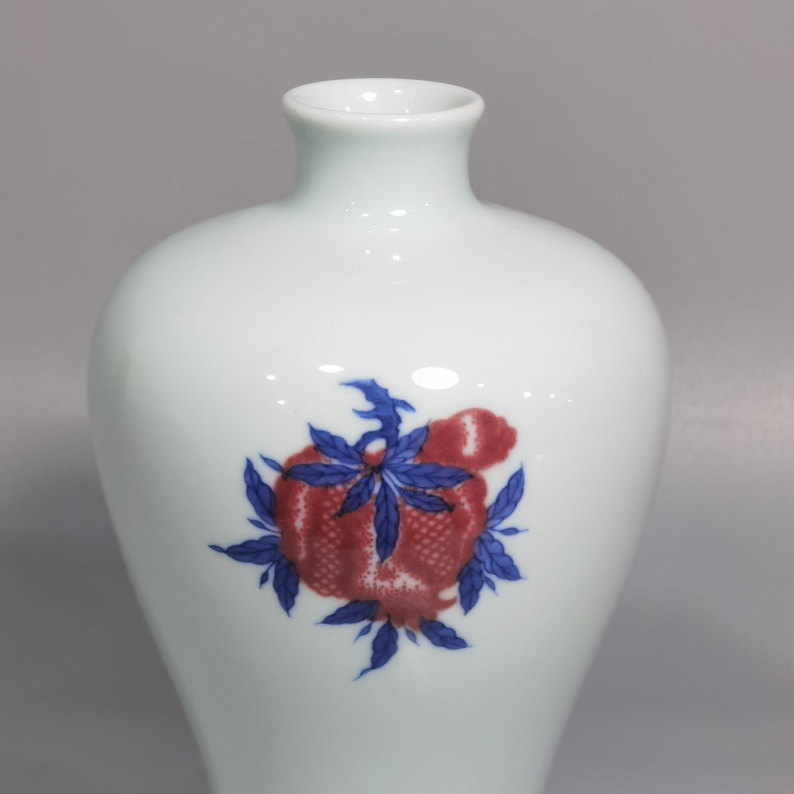 Qing Dynasty Yongzheng blue and white underglaze red plum vase