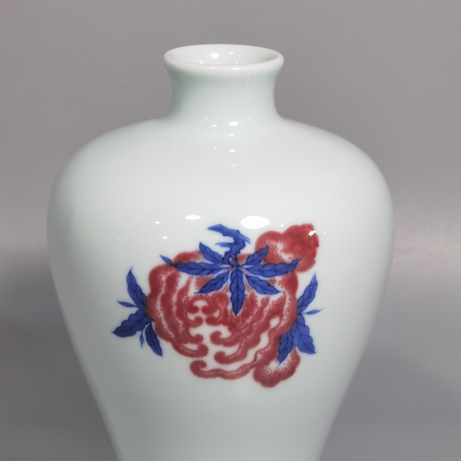Qing Dynasty Yongzheng blue and white underglaze red plum vase