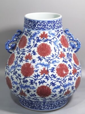 Qing Dynasty Yongzheng blue and white underglaze red lotus pattern Ruyi ear Vase