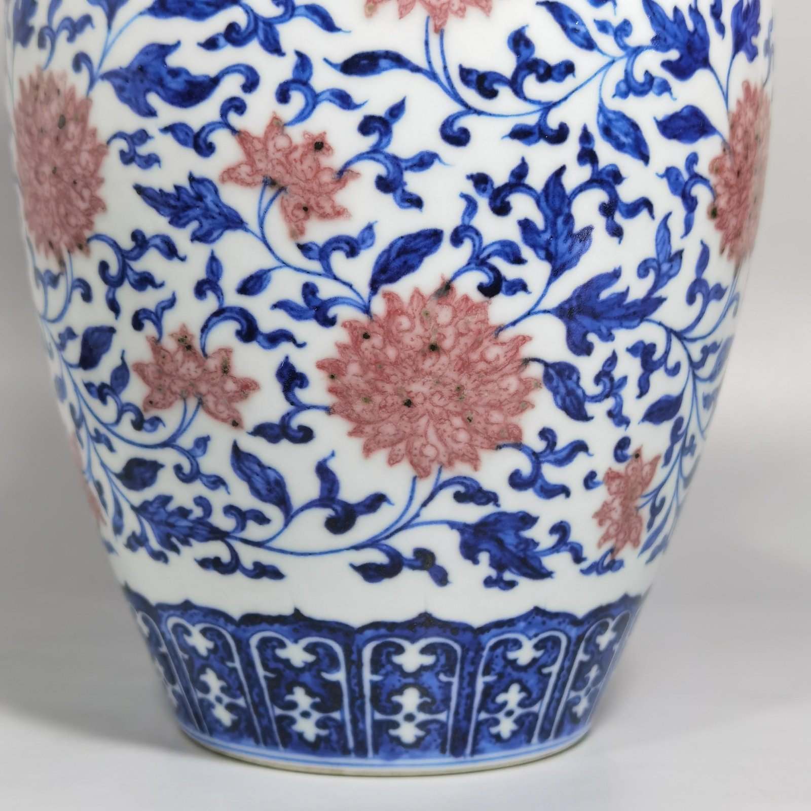 Qing Dynasty Yongzheng blue and white underglaze red lotus pattern skimming bottle