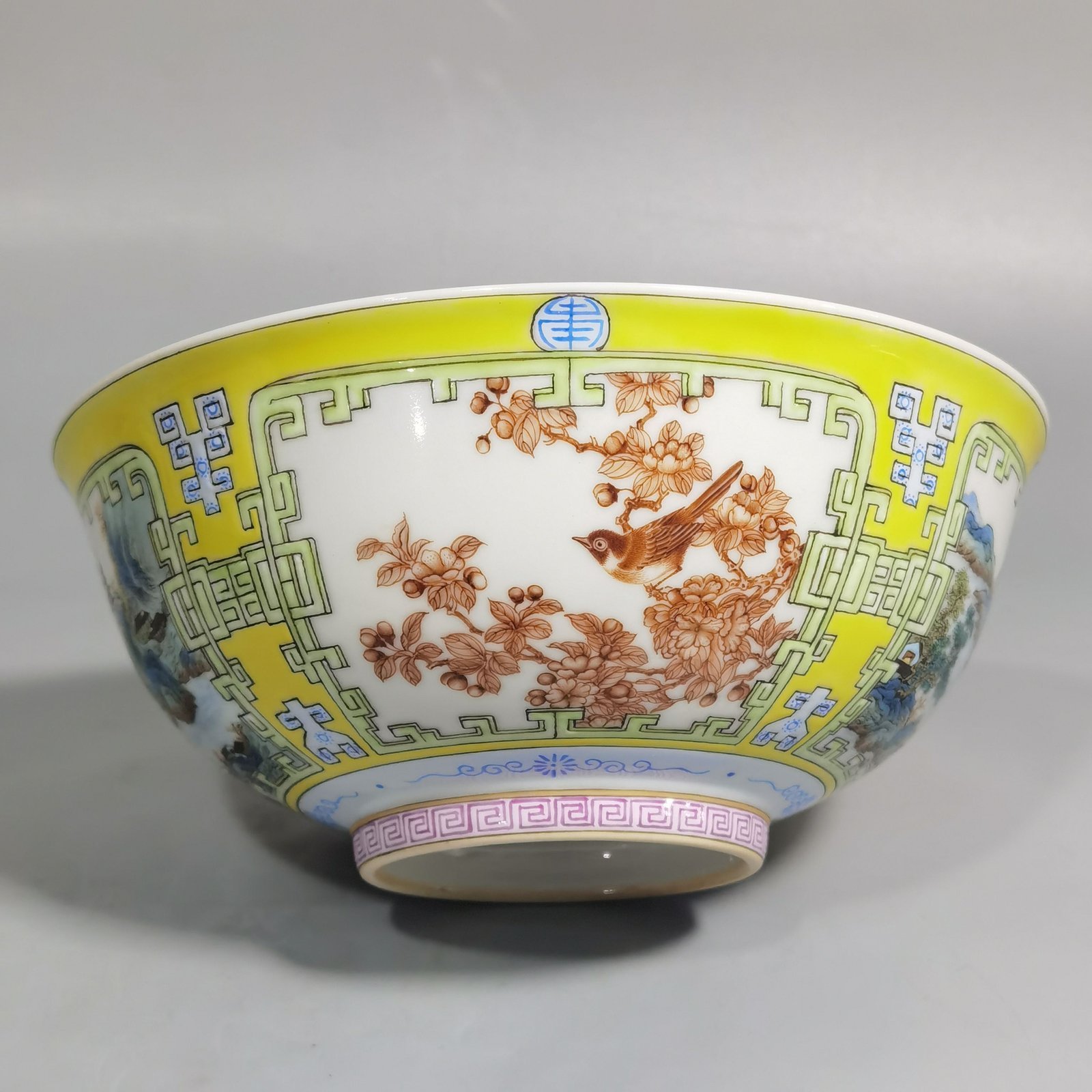 Qing Dynasty Yongzheng yellow ground pastel a pair of blue and white palace bowls with Cowherd