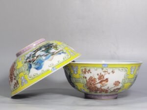 Qing Dynasty Yongzheng yellow ground pastel a pair of blue and white flower palace bowls