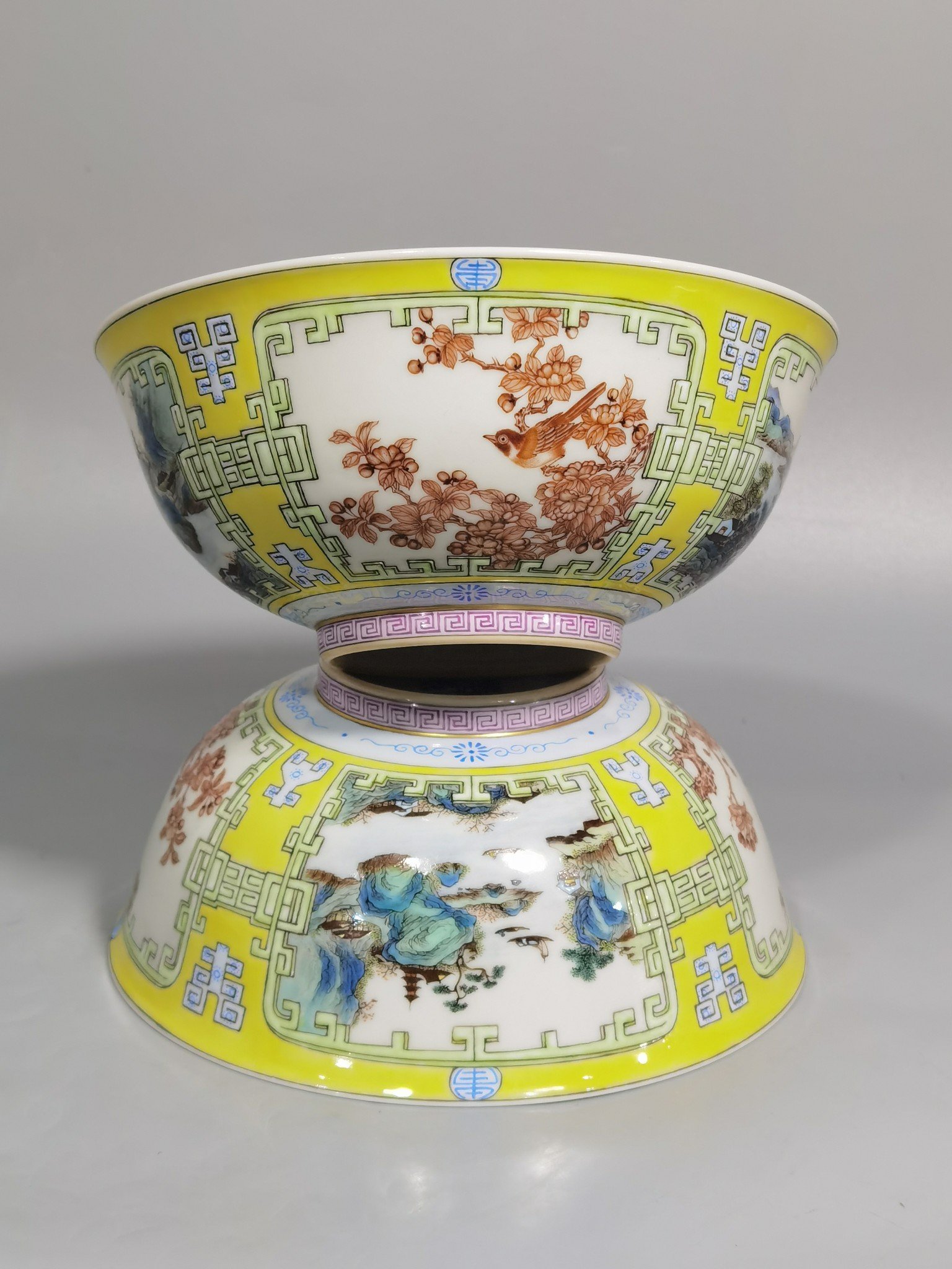 Qing Dynasty Yongzheng yellow ground pastel a pair of blue and white flower palace bowls