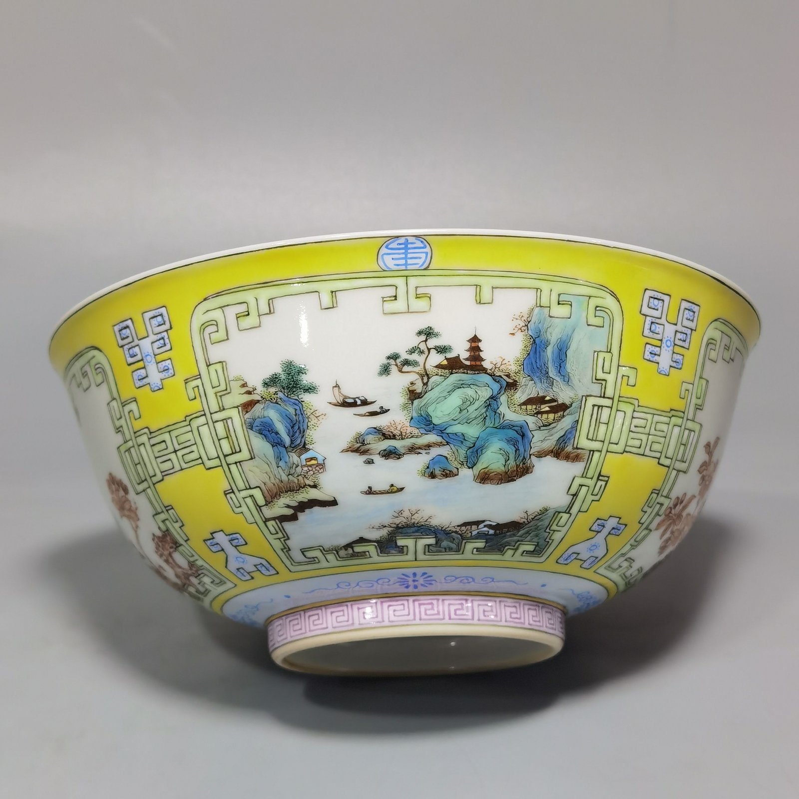 Qing Dynasty Yongzheng yellow ground pastel a pair of blue and white flower palace bowls