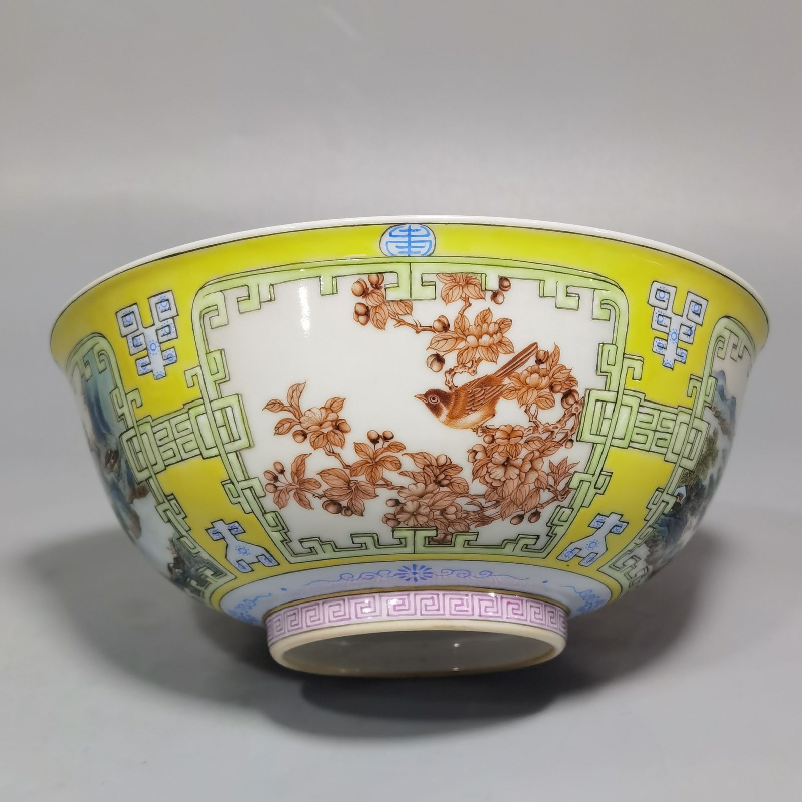 Qing Dynasty Yongzheng yellow ground pastel a pair of blue and white flower palace bowls