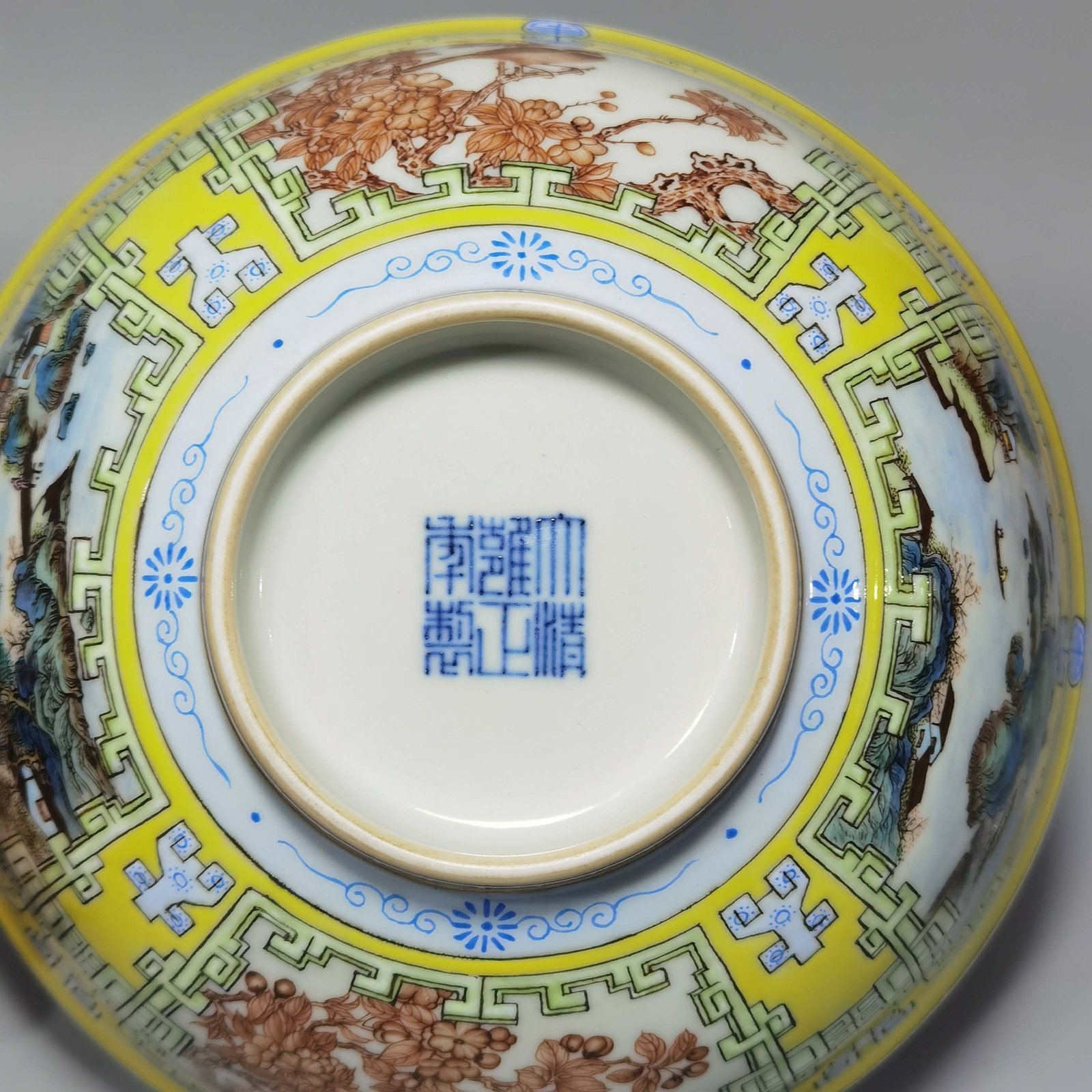 Qing Dynasty Yongzheng yellow ground pastel a pair of blue and white flower palace bowls