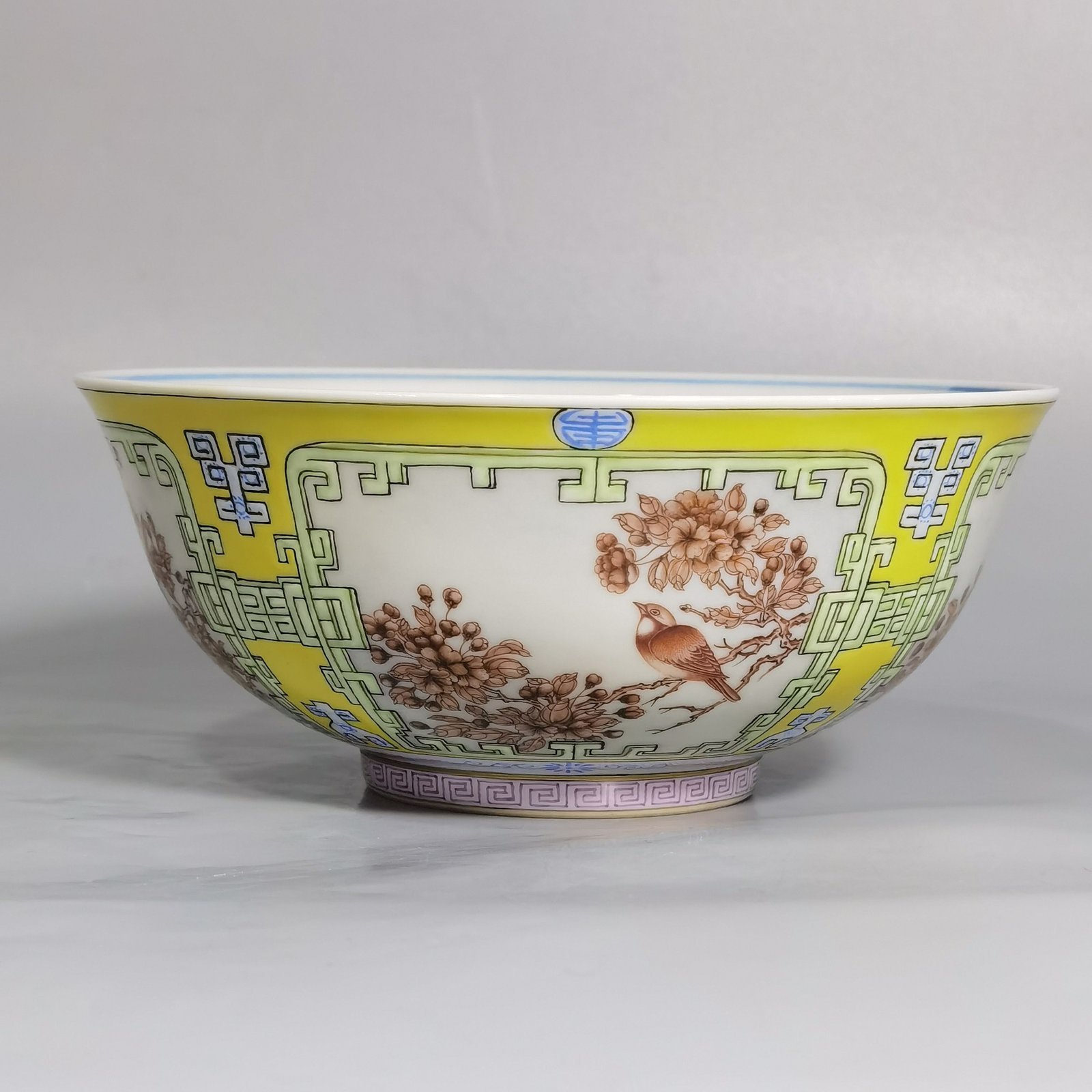Qing Dynasty Yongzheng yellow ground pastel a pair of blue and white flower palace bowls