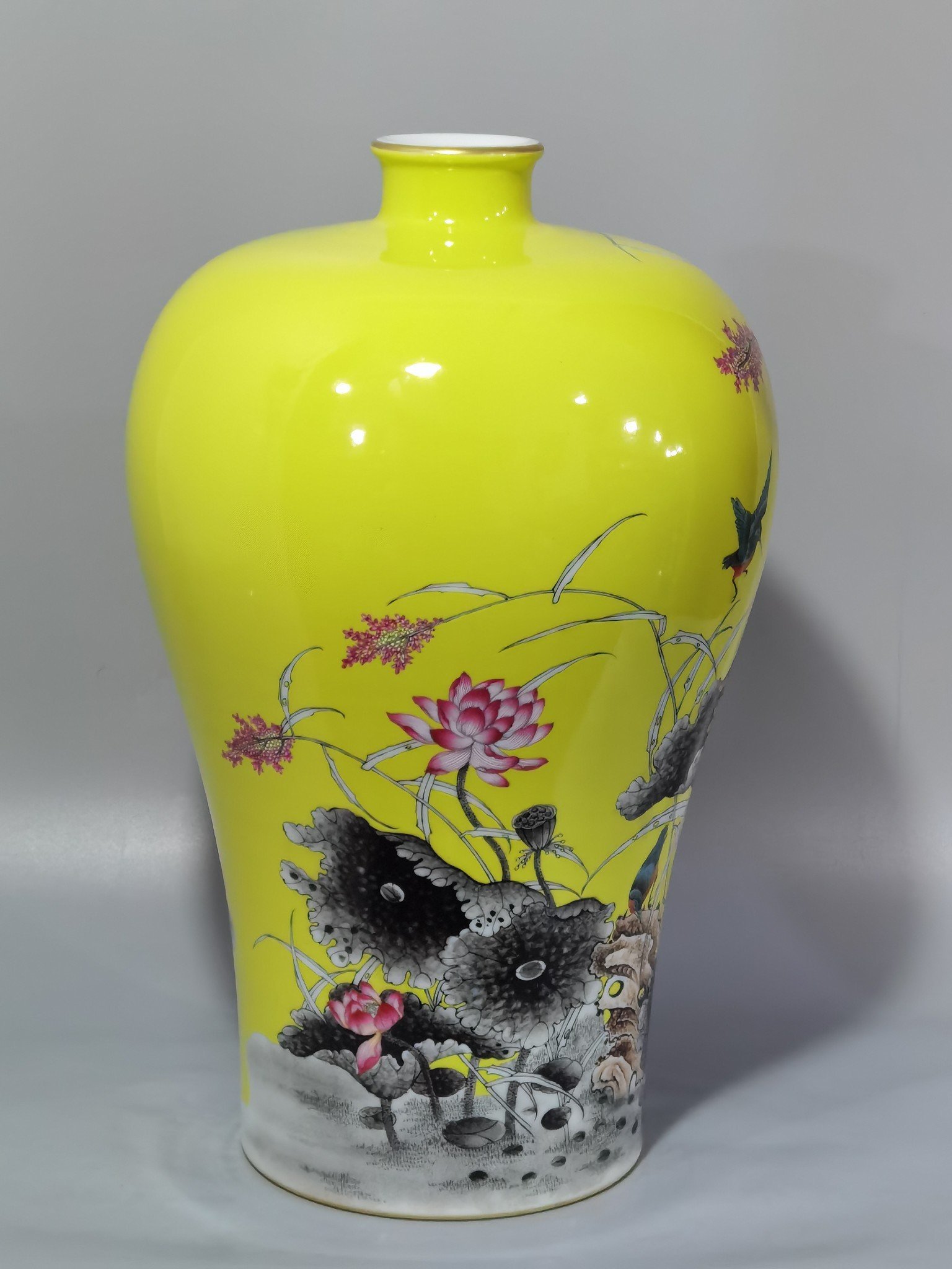 Qing Dynasty Yongzheng yellow ground pastel color lotus and kingfisher plum vase