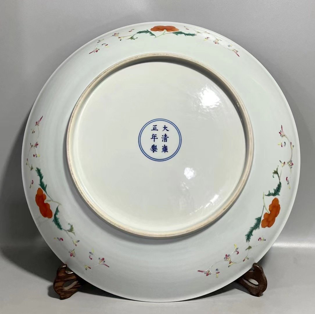 Qing Dynasty Yongzheng an enamel flower and bird dish with entwining branches and a window