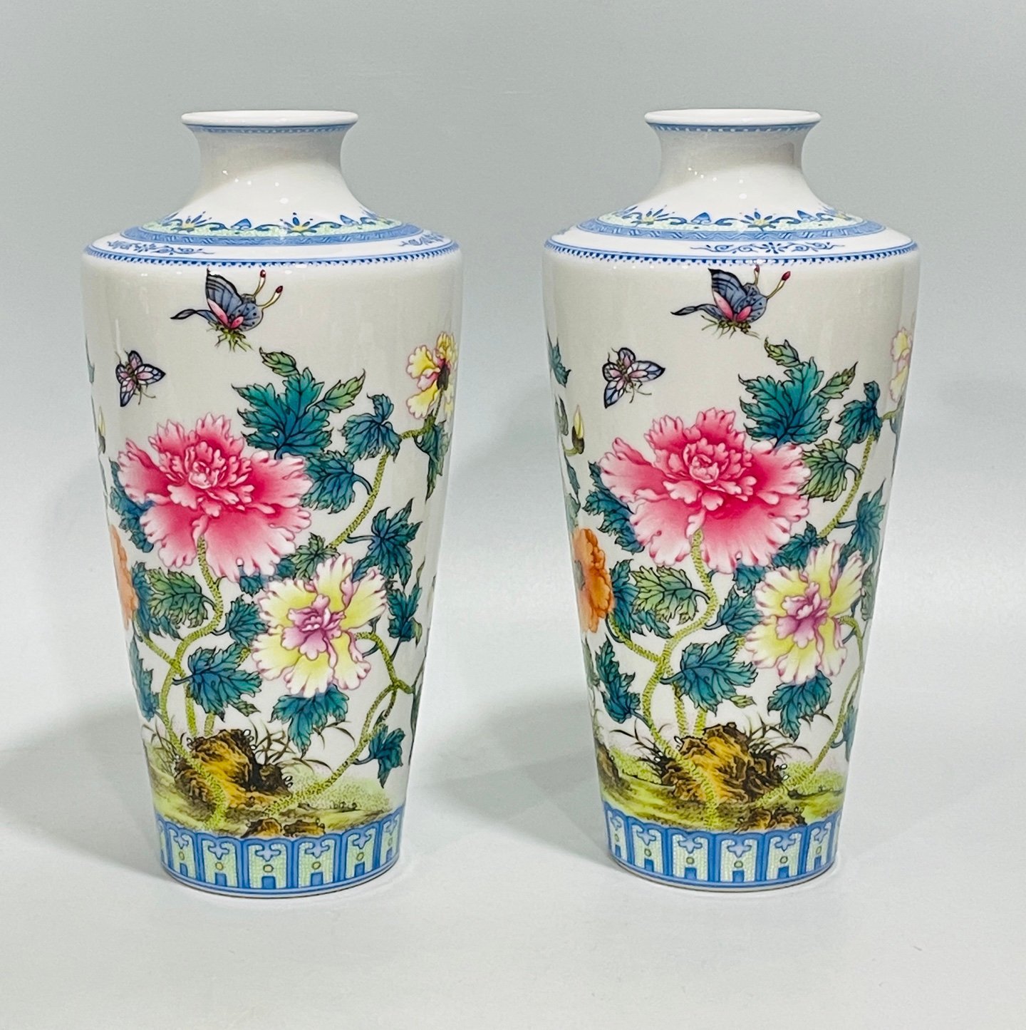 Qing Dynasty Yongzheng enamel butterfly and plum vase