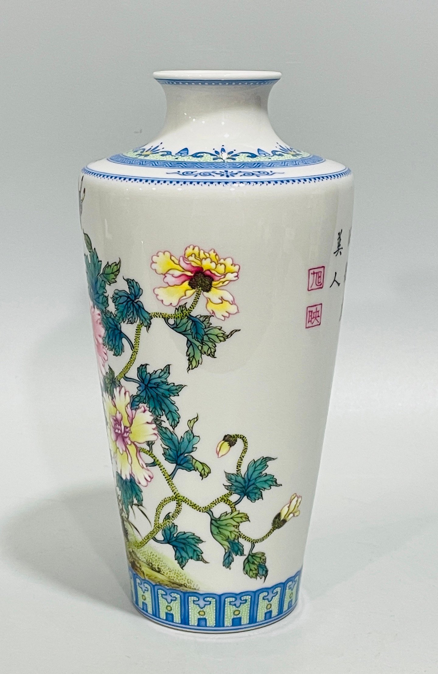 Qing Dynasty Yongzheng enamel butterfly and plum vase