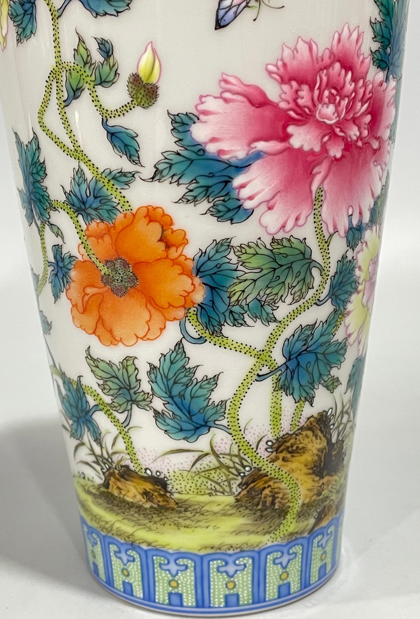 Qing Dynasty Yongzheng enamel butterfly and plum vase