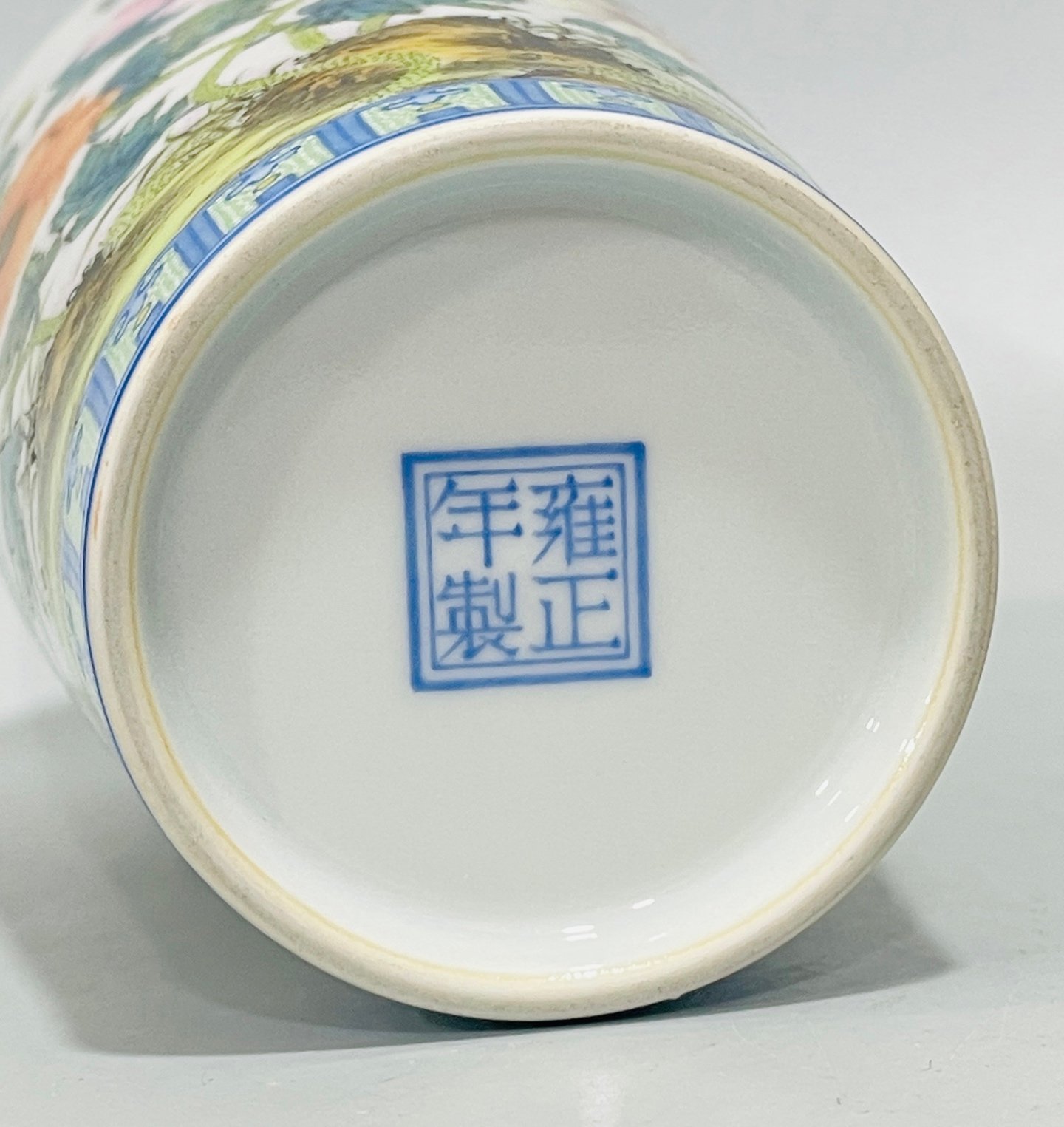 Qing Dynasty Yongzheng enamel butterfly and plum vase