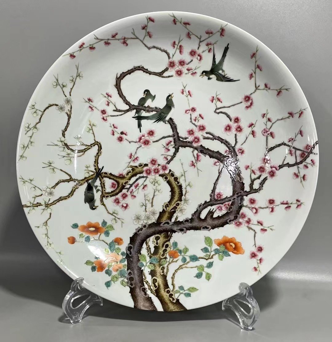 Qing Dynasty Yongzheng pastel paintings of flowers and birds on a branch plate