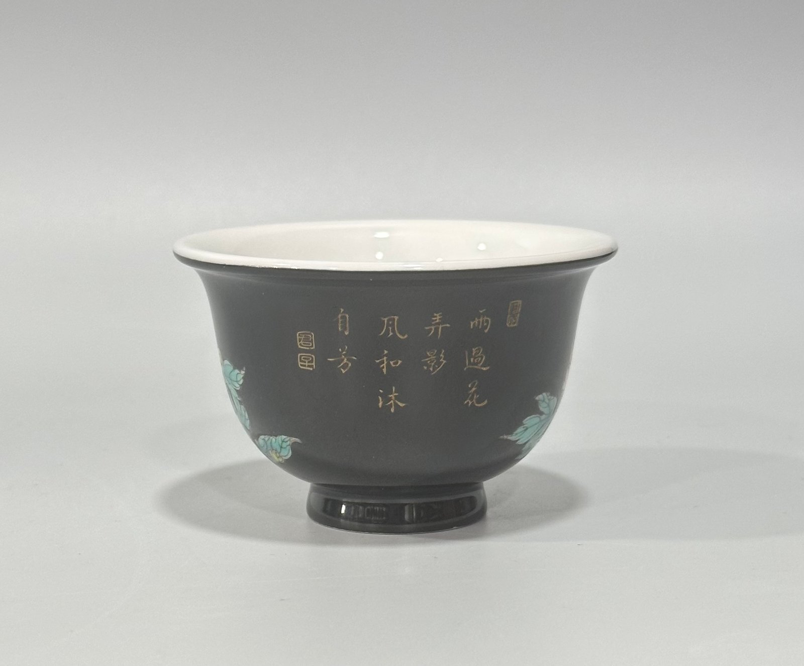 Qing Dynasty Yongzheng Enamel black gold glaze cup with peony pattern