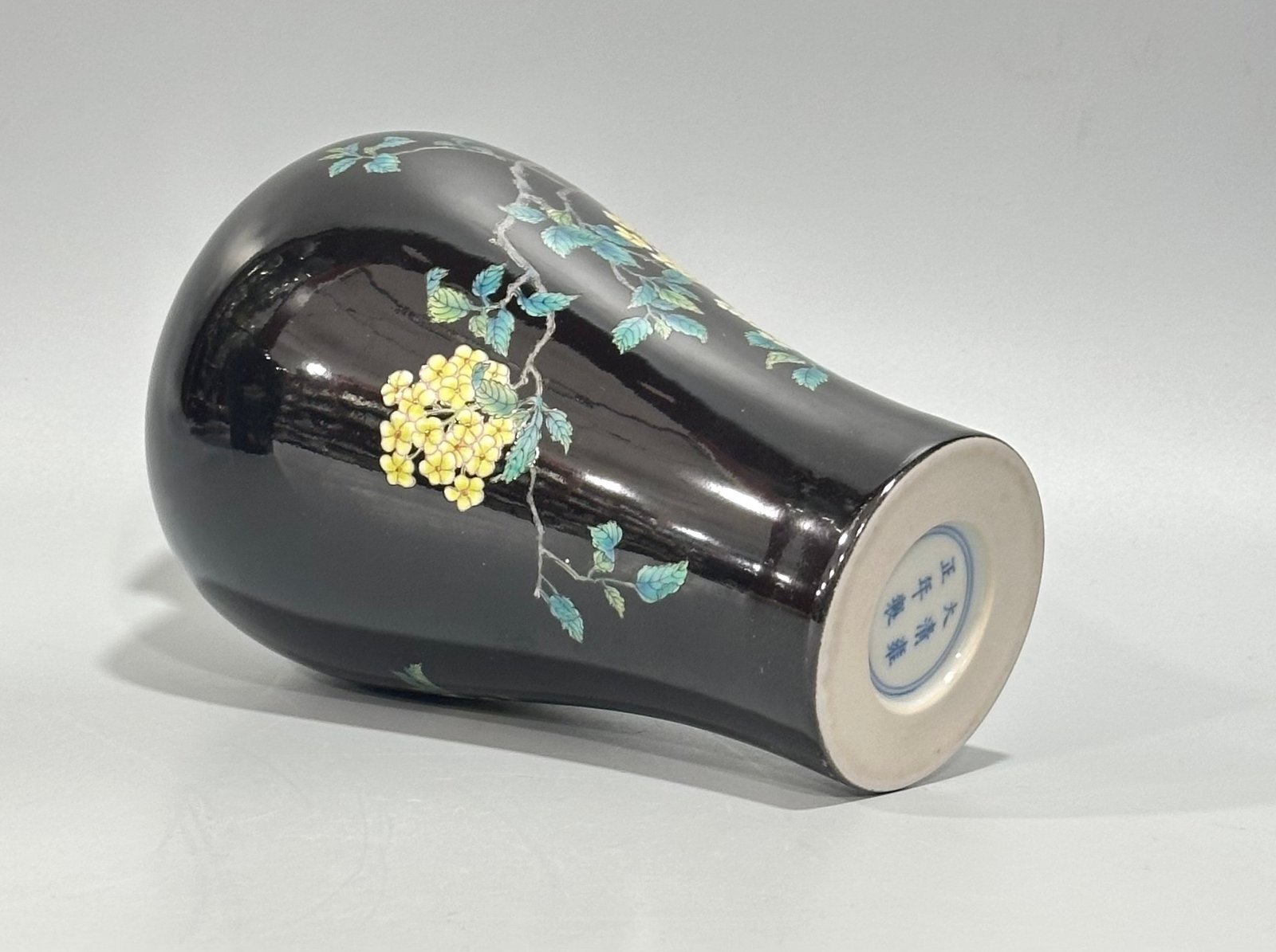 Qing Dynasty Yongzheng enamel black gold glaze small plum vase with flower and bird patterns