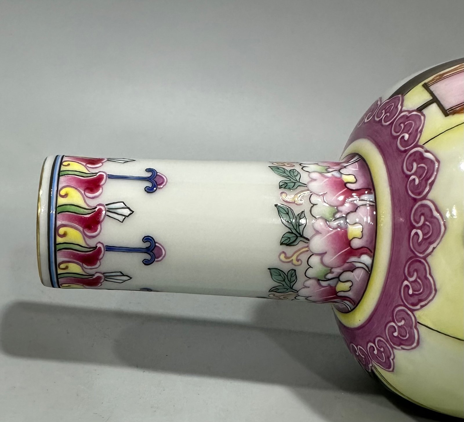 Qing Dynasty Yongzheng Enamel vase with figures watching books and pictures