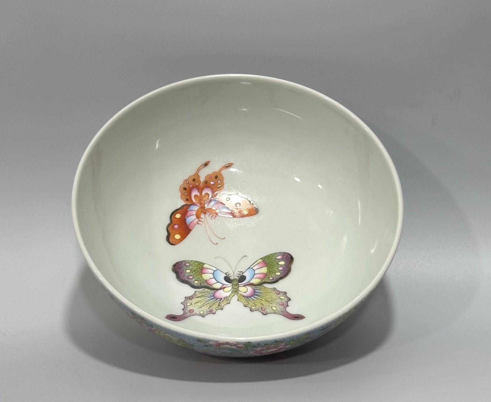 Qing Dynasty Yongzheng enamel bowl with split branches flowers and butterflies