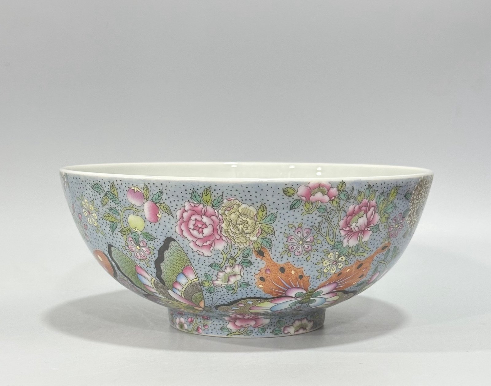 Qing Dynasty Yongzheng enamel bowl with split branches flowers and butterflies