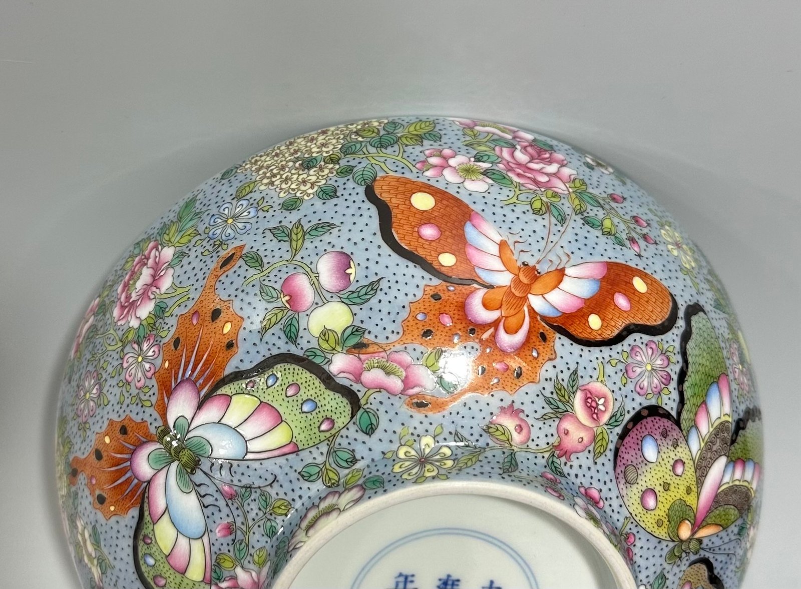 Qing Dynasty Yongzheng enamel bowl with split branches flowers and butterflies