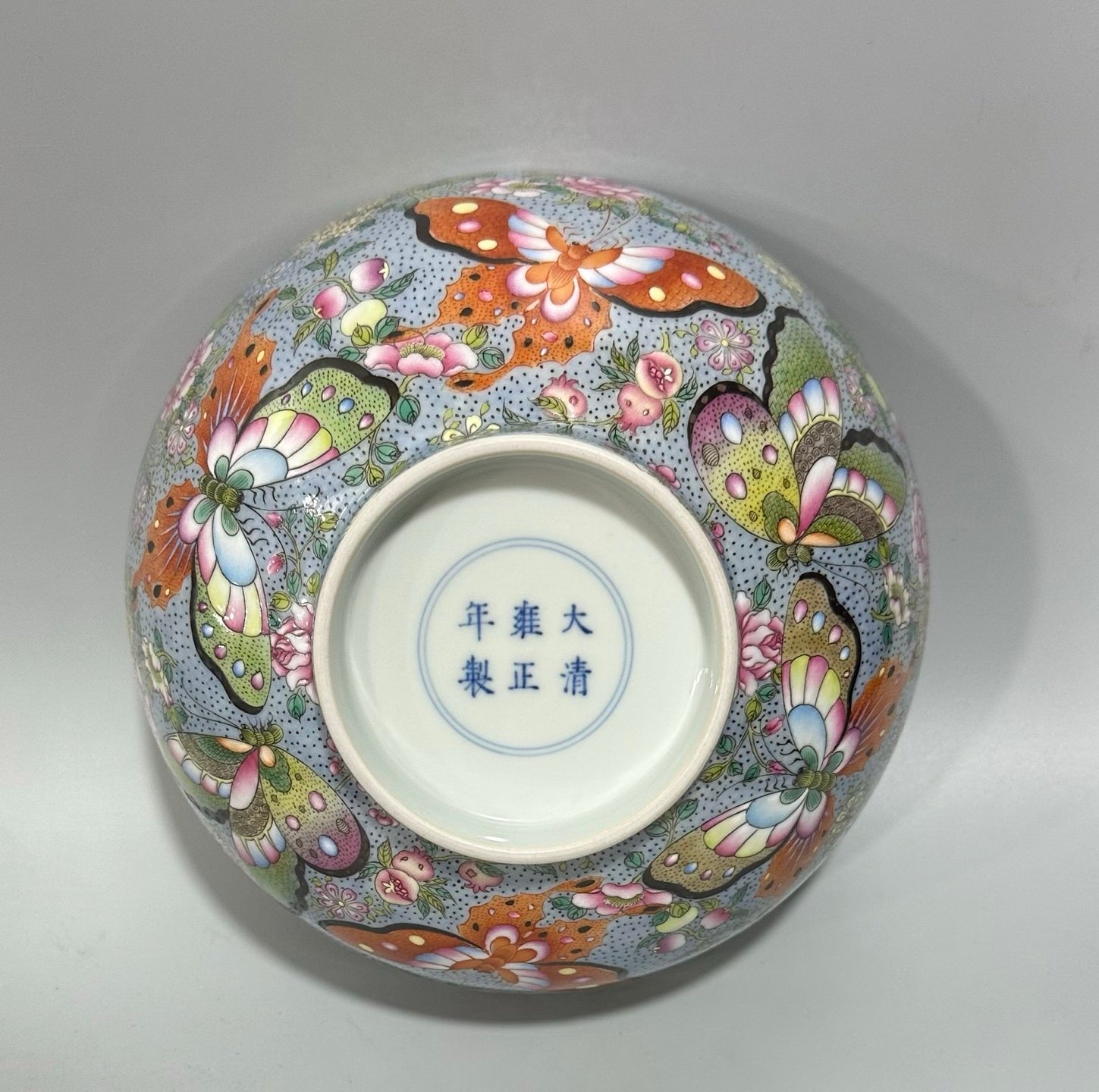 Qing Dynasty Yongzheng enamel bowl with split branches flowers and butterflies