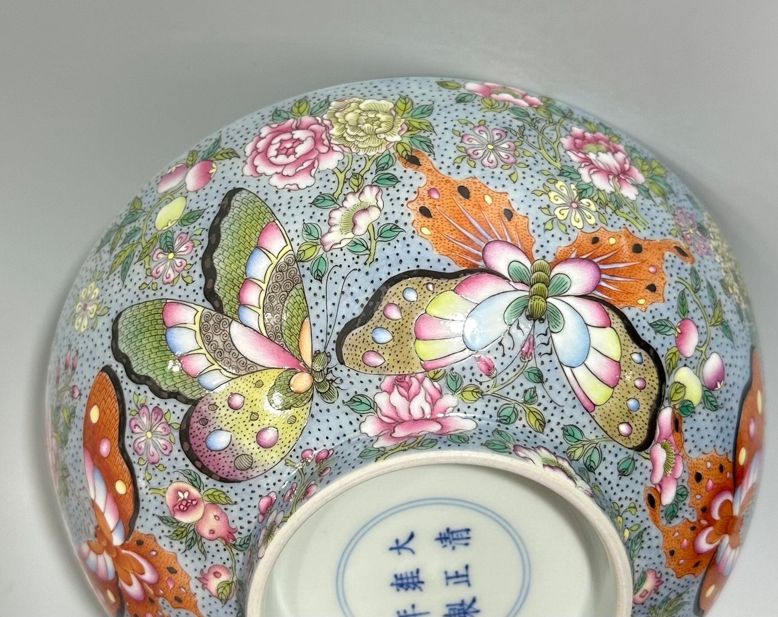 Qing Dynasty Yongzheng enamel bowl with split branches flowers and butterflies