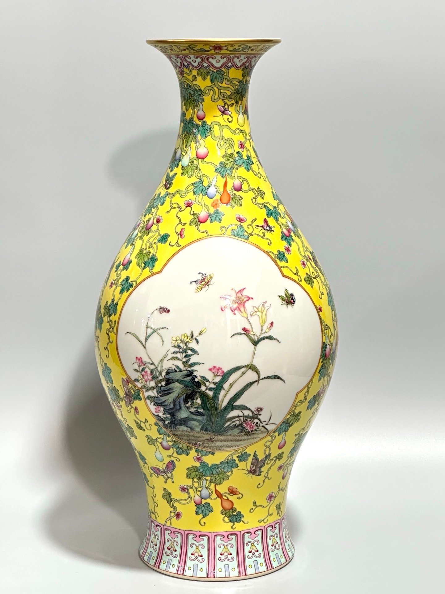 Qing Dynasty Yongzheng Enamel lemon yellow gourd butterfly branches window flower and bird olive vase