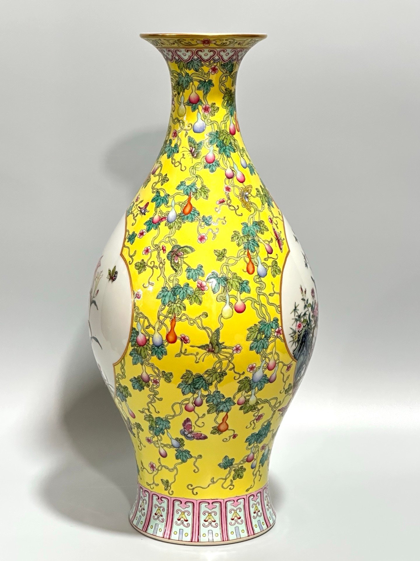 Qing Dynasty Yongzheng Enamel lemon yellow gourd butterfly branches window flower and bird olive vase