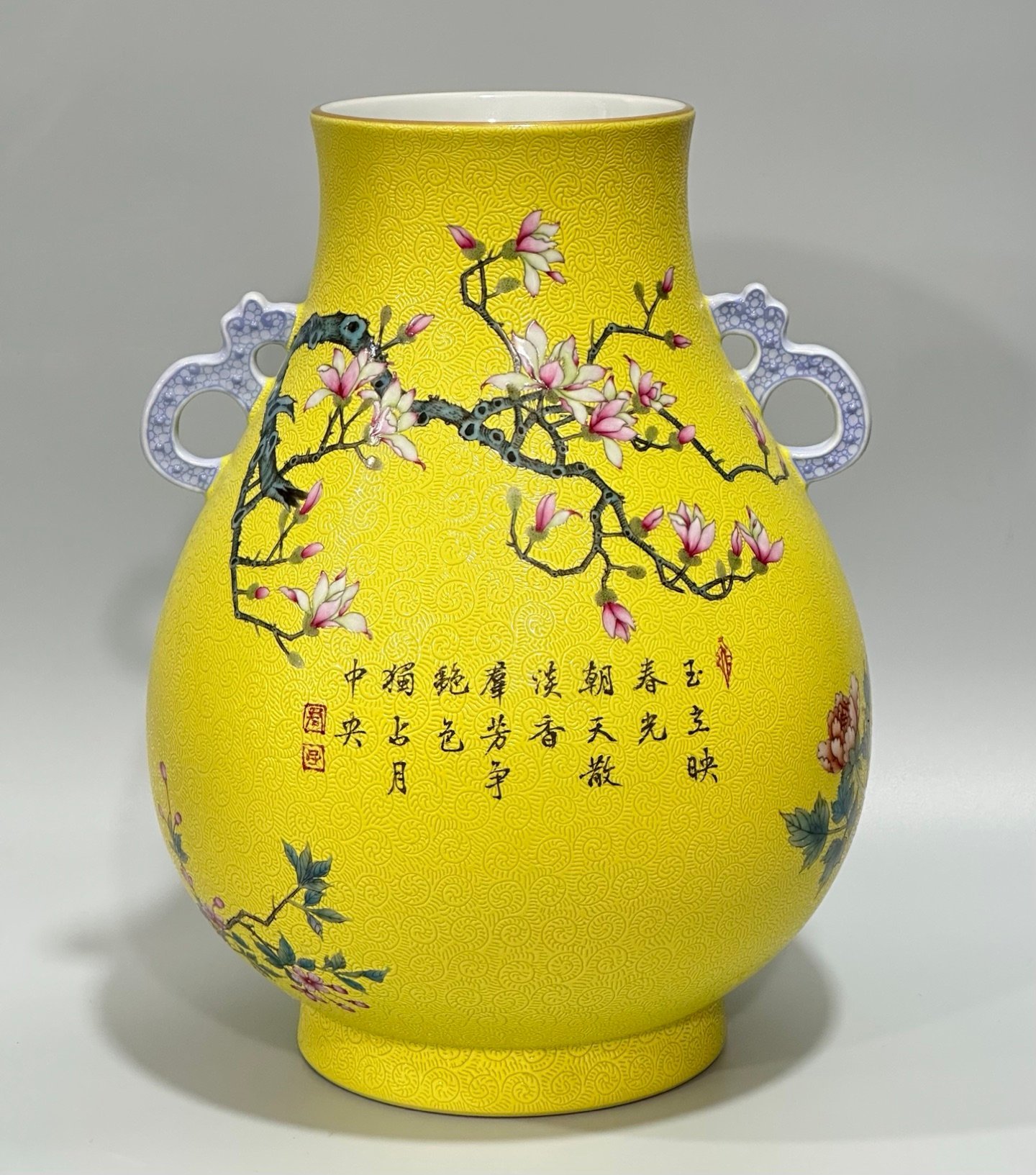 Qing Dynasty Yongzheng Enamel lemon yellow glaze orbital flower and bird poetry double-eared statue