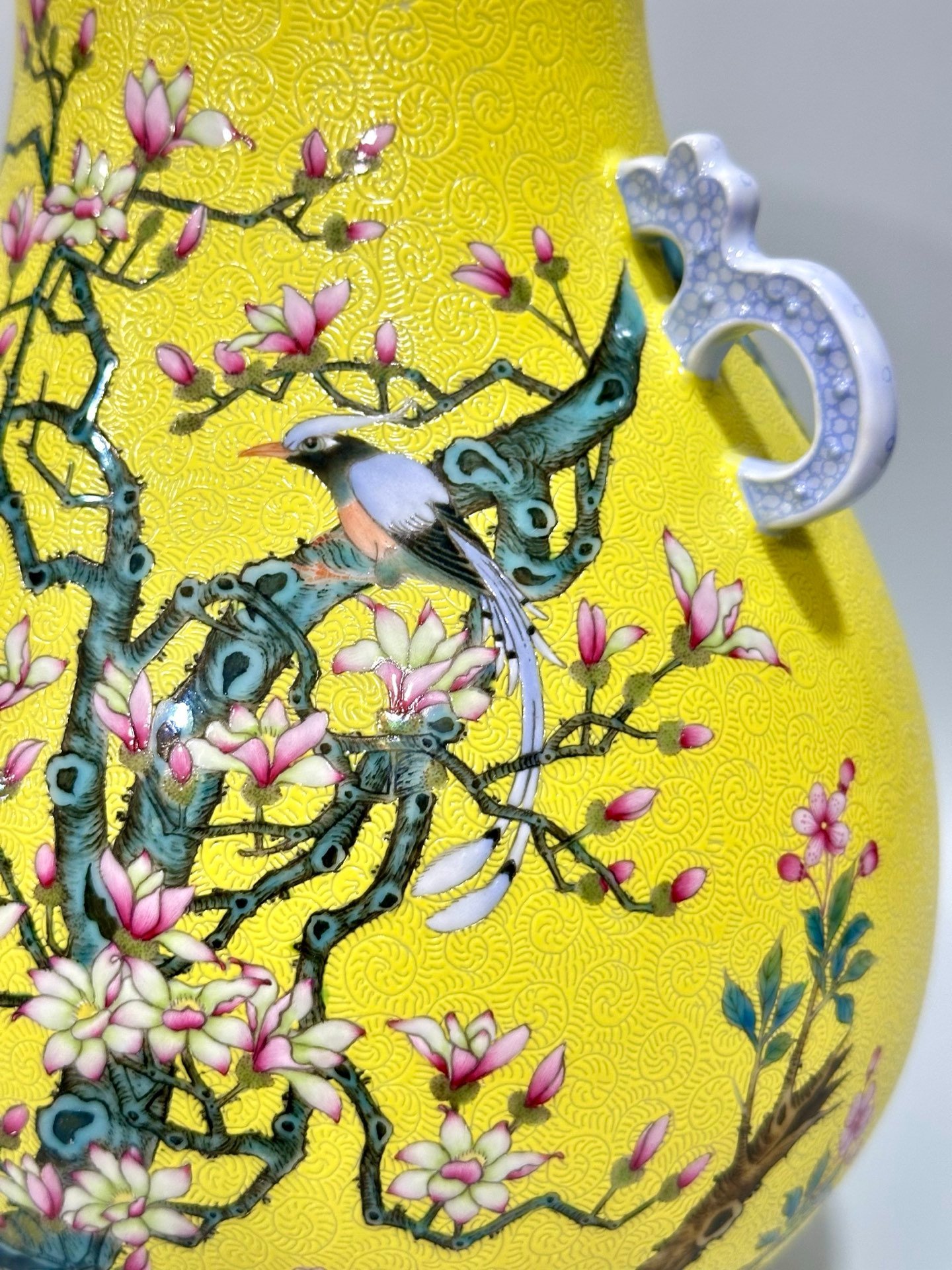 Qing Dynasty Yongzheng Enamel lemon yellow glaze orbital flower and bird poetry double-eared statue